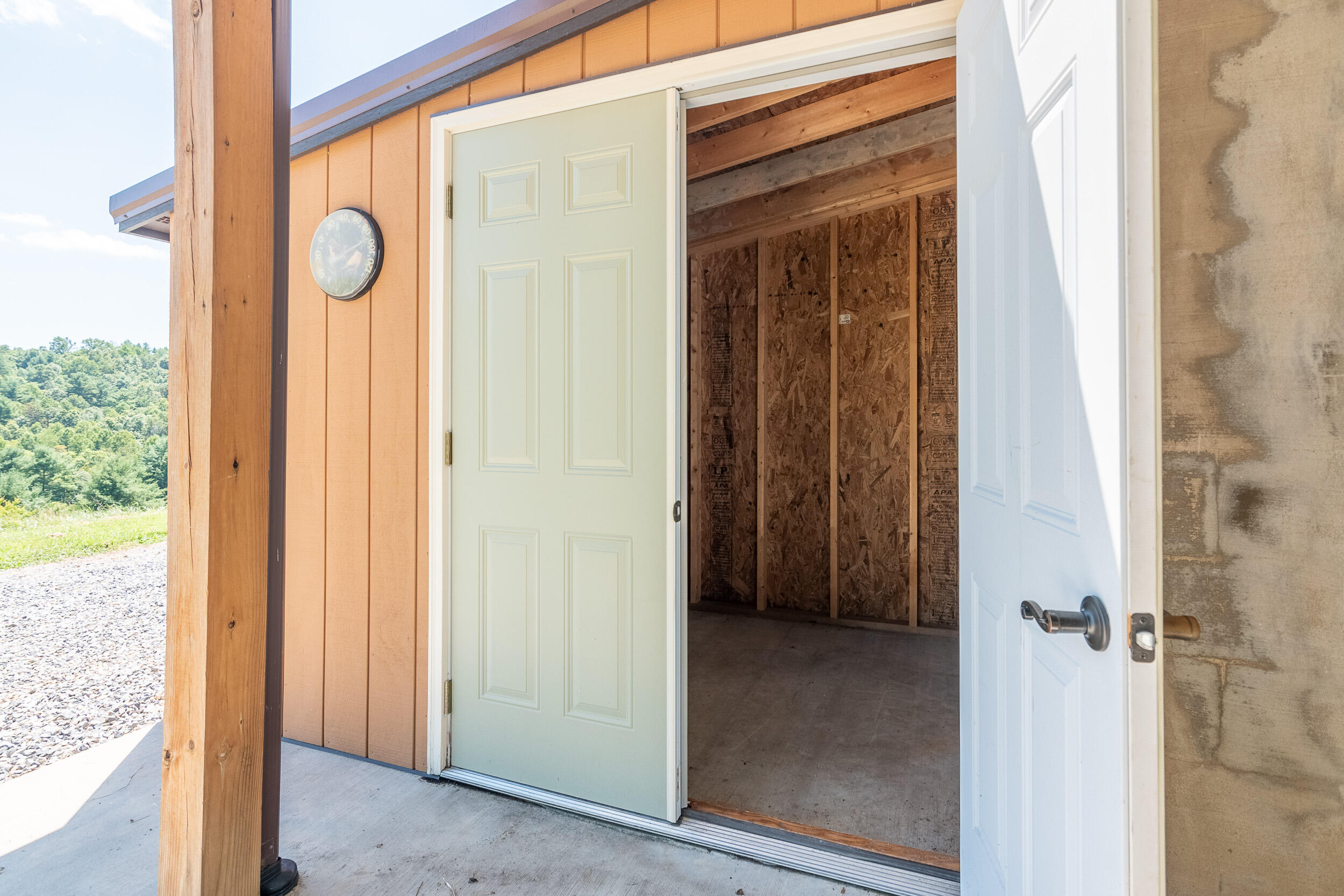 995 White Oak Grove Road Northeast Riner, VA 24149 - Photo 57 of 70 a view of front door with a door and a window