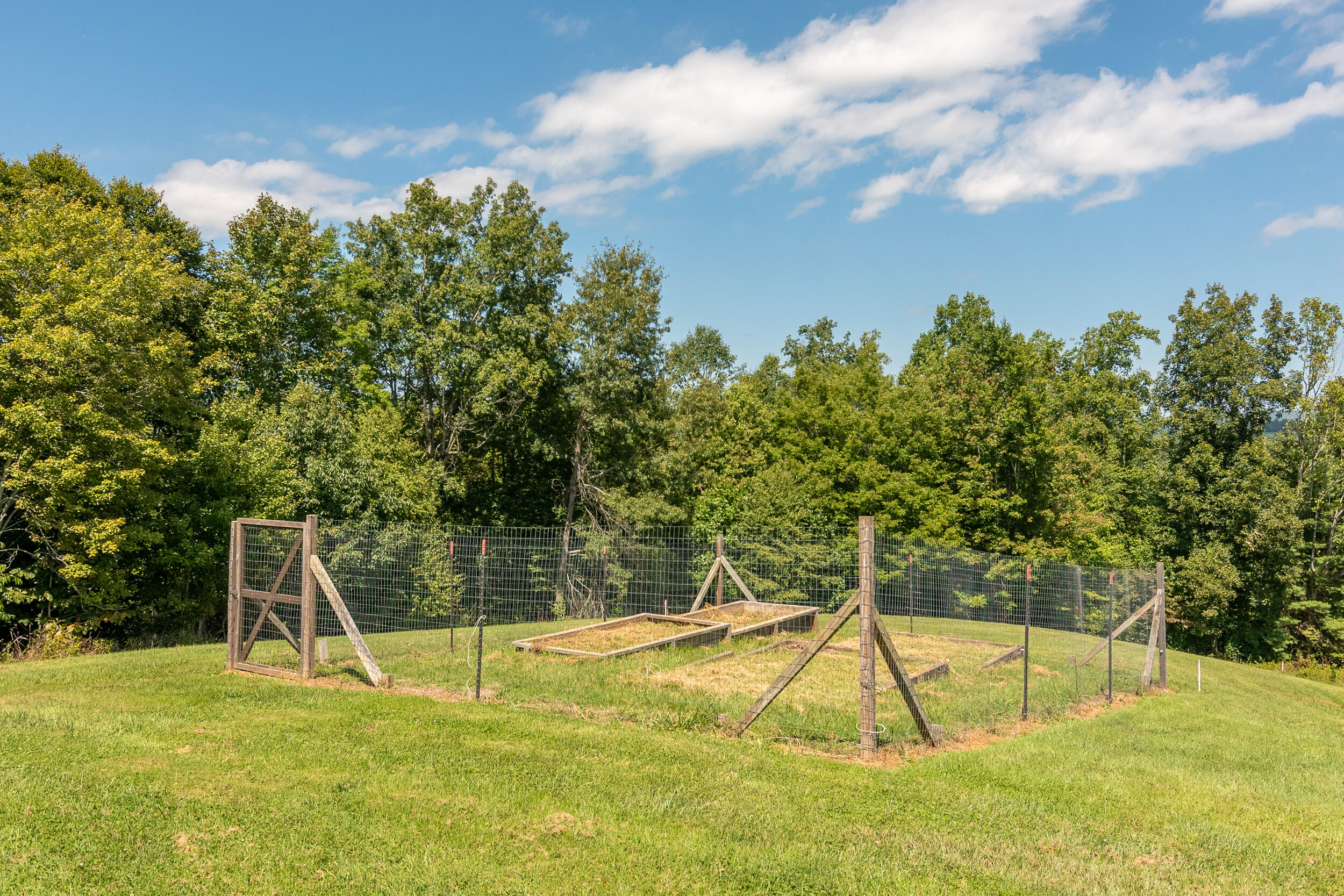995 White Oak Grove Road Northeast Riner, VA 24149 - Photo 62 of 70 a view of a swimming pool with a house in the background