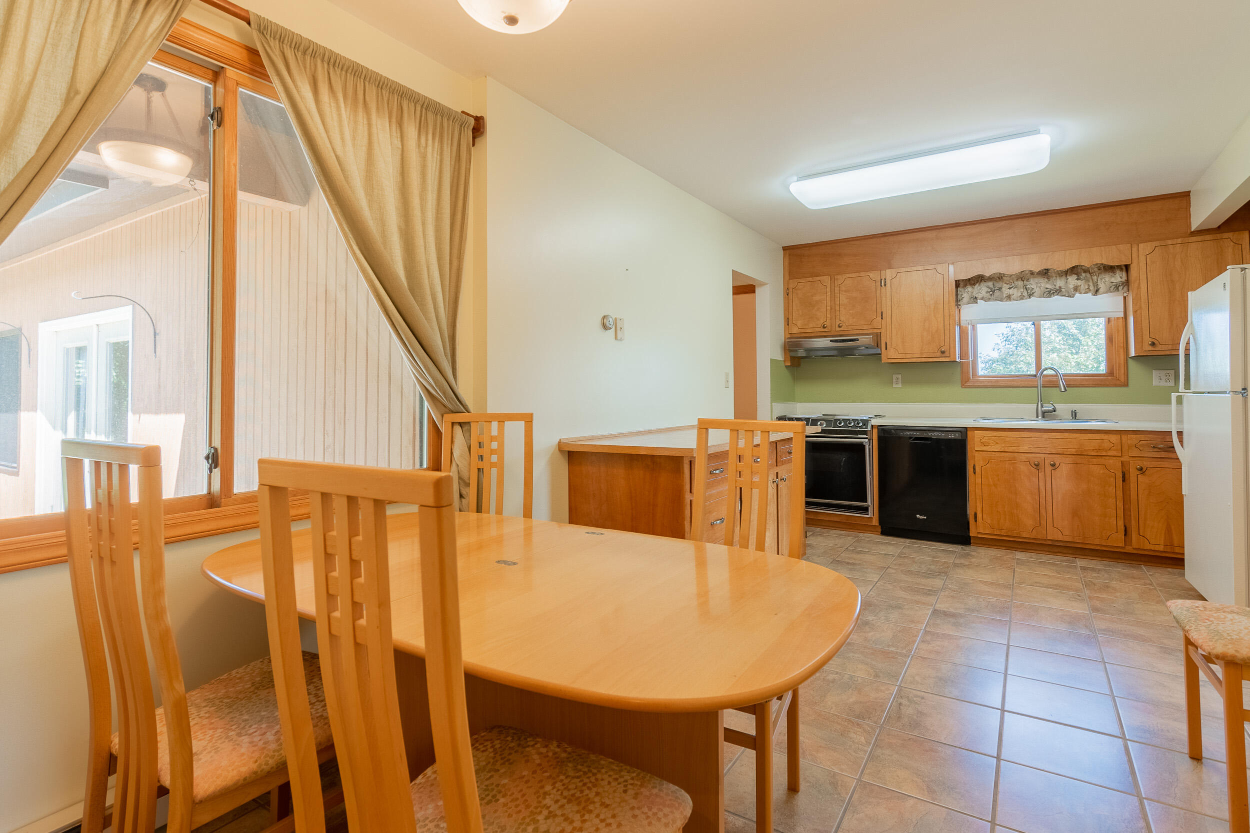 995 White Oak Grove Road Northeast Riner, VA 24149 - Photo 10 of 70 a large kitchen with a table and chairs