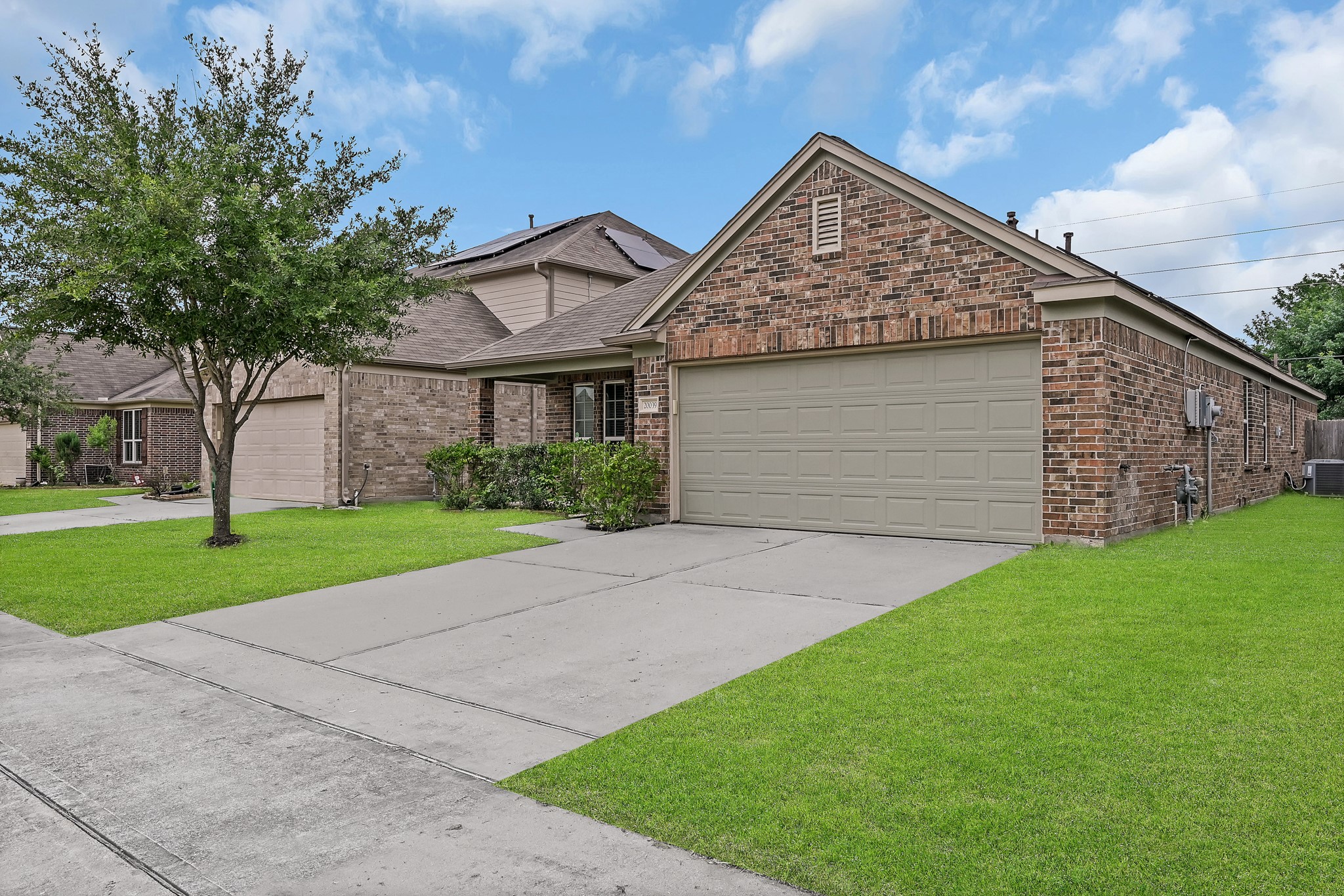 20039 Sunshine Ridge Lane Cypress, TX 77429 - Photo 2 of 22 Doble drive way and solar panles on the righ side of the roof too