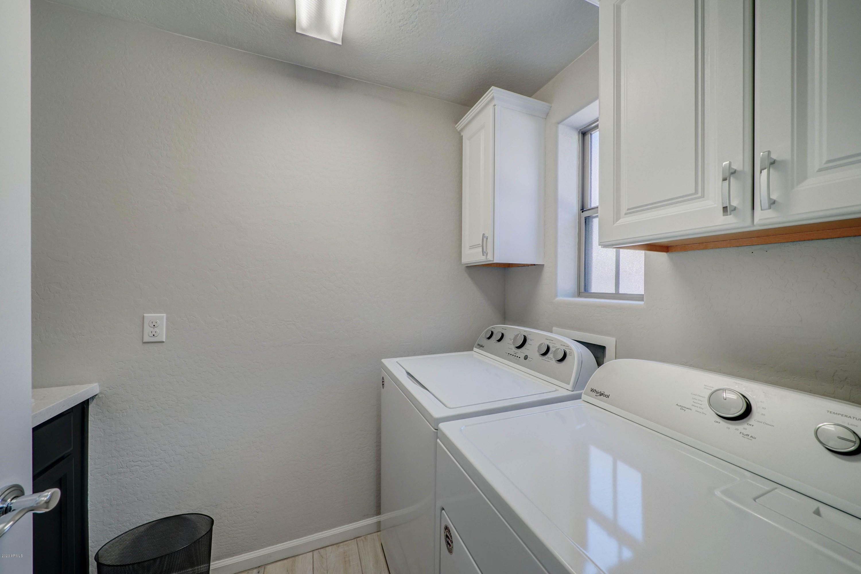 3935 East Rough Rider Road, Unit 1267 Phoenix, AZ 85050 - Photo 14 of 34 Laundry Room