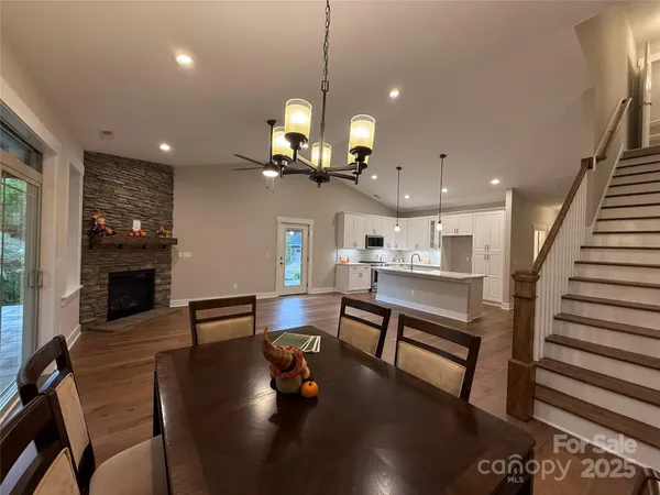 a kitchen with white cabinets stainless steel appliances and sink