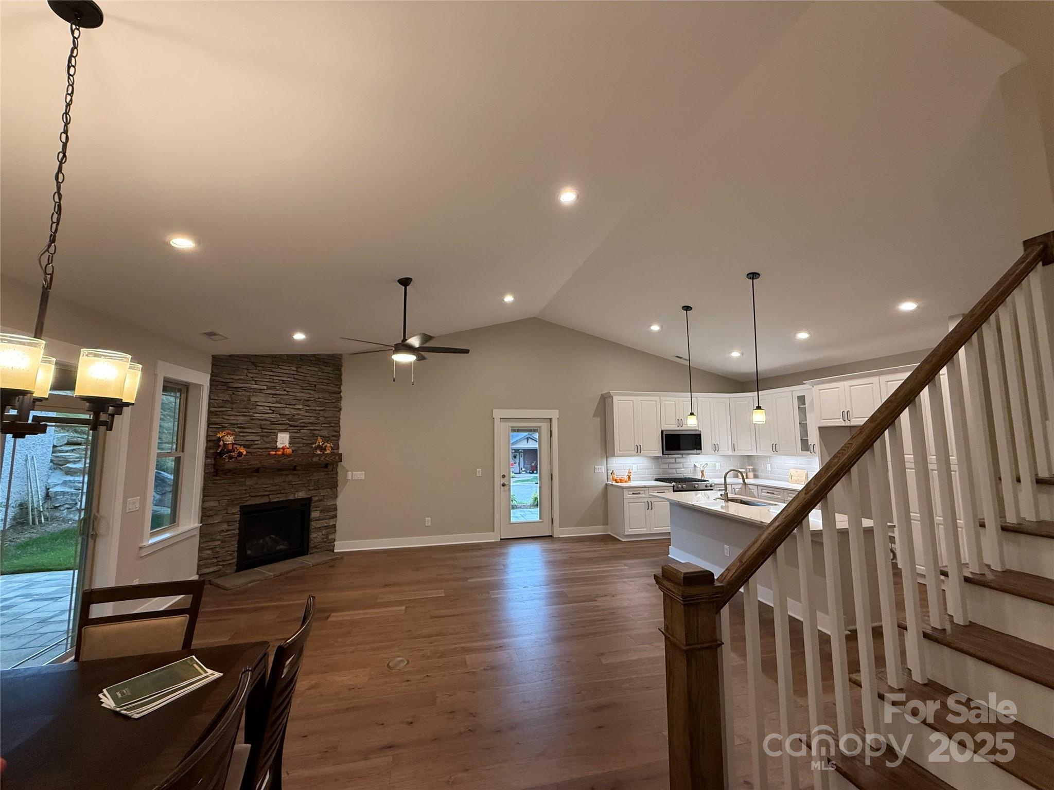 20 Craftsman Overlook Ridge Arden, NC 28704 - Photo 5 of 16 a view of a hallway with wooden floor and staircase