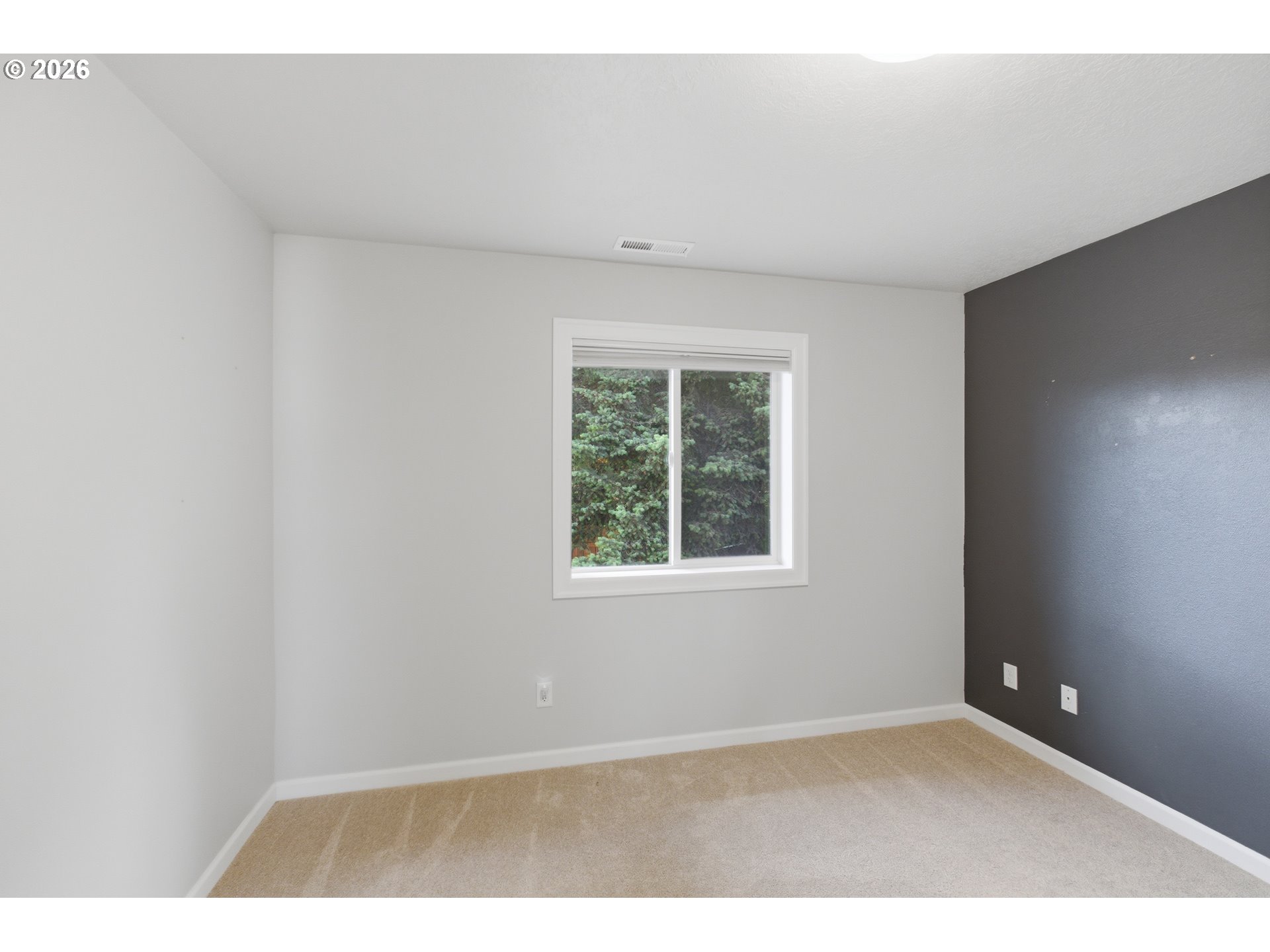 2925 Doaks Ferry Road Northwest Salem, OR 97304 - Photo 38 of 47 a view of an empty room with a window