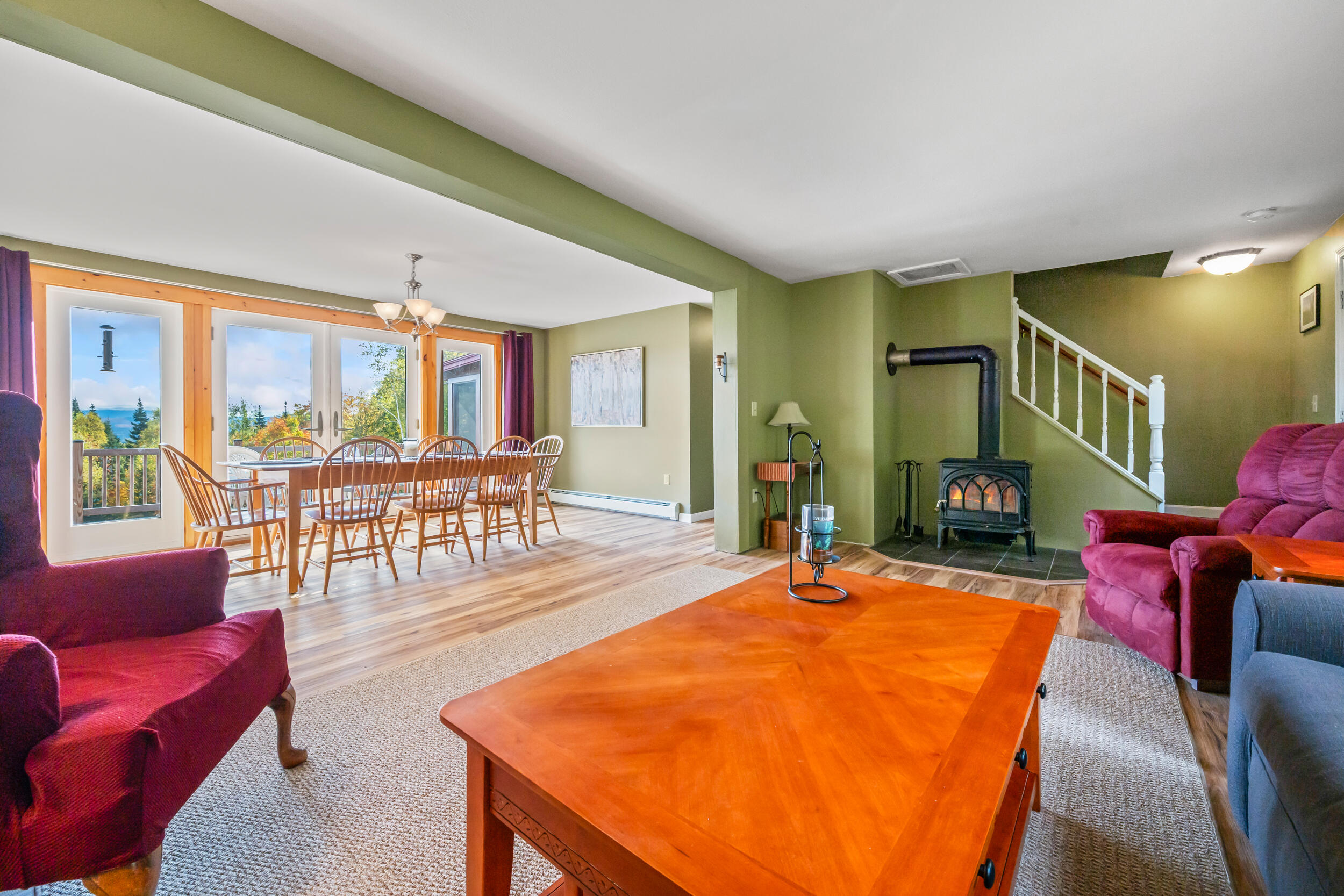 577 Loon Lake Road Rangeley, ME 04970 - Photo 13 of 62 Living Room Into Dining Room