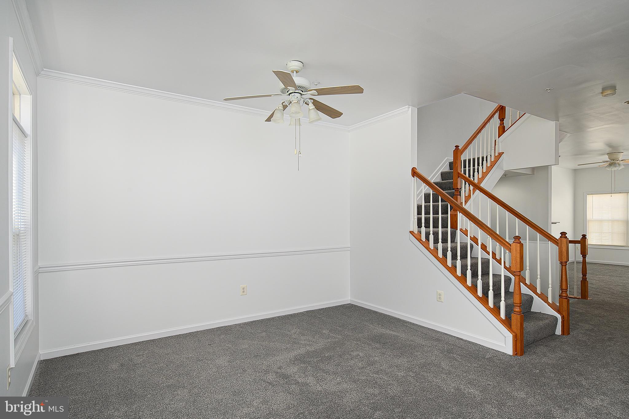 10229 Brighton Ridge Way, Unit 116 Columbia, MD 21044 - Photo 11 of 31 a view of empty room with stairs