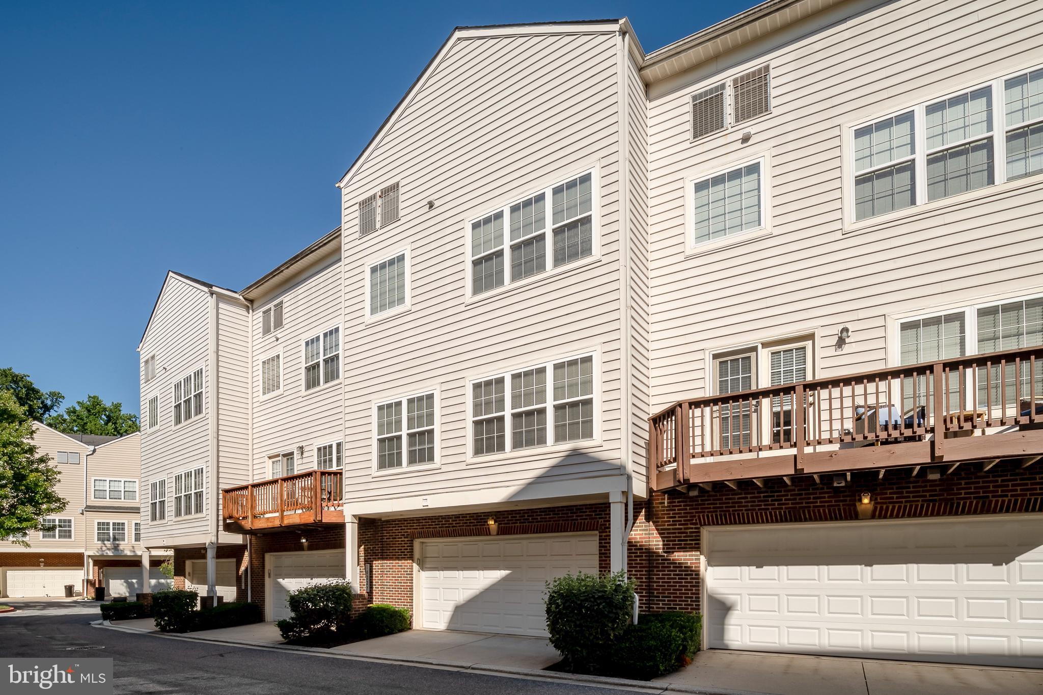 10229 Brighton Ridge Way, Unit 116 Columbia, MD 21044 - Photo 31 of 31 a front view of a building with street