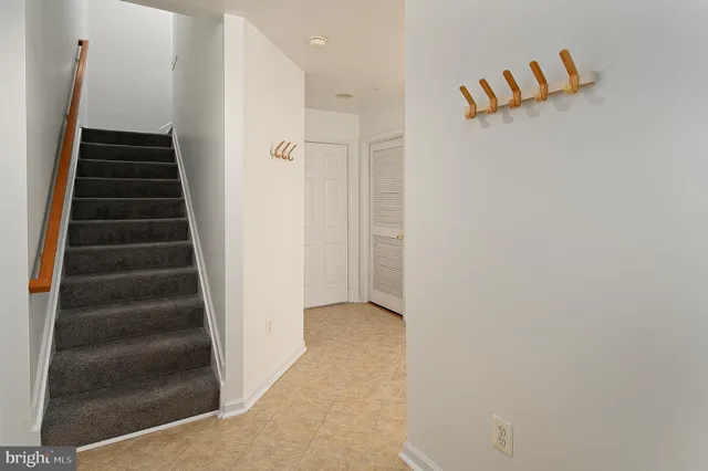 a view of a hallway with stairs
