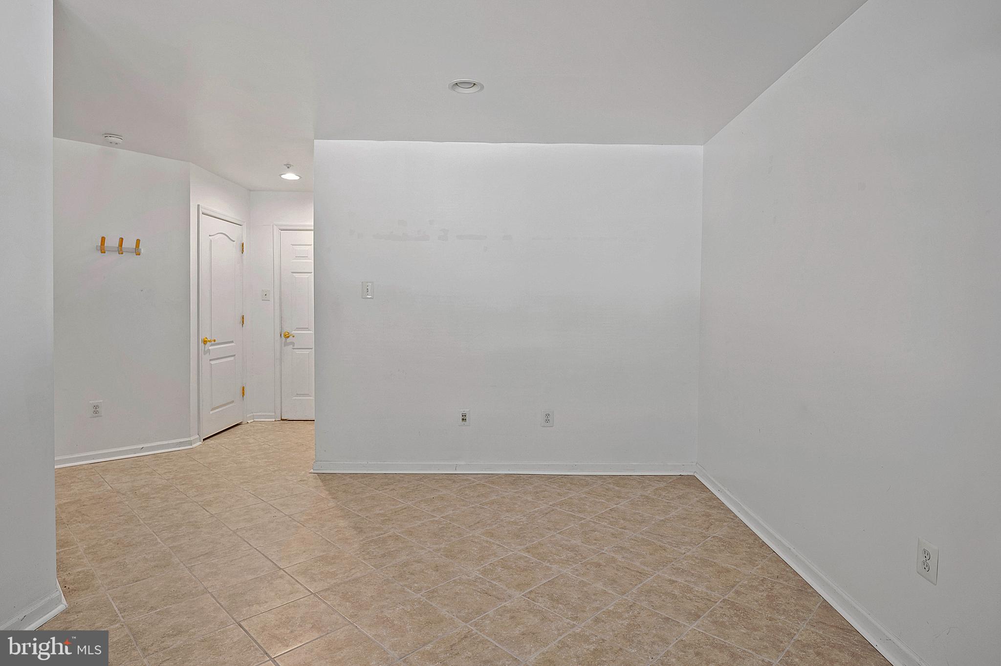 10229 Brighton Ridge Way, Unit 116 Columbia, MD 21044 - Photo 7 of 31 a view of an empty room