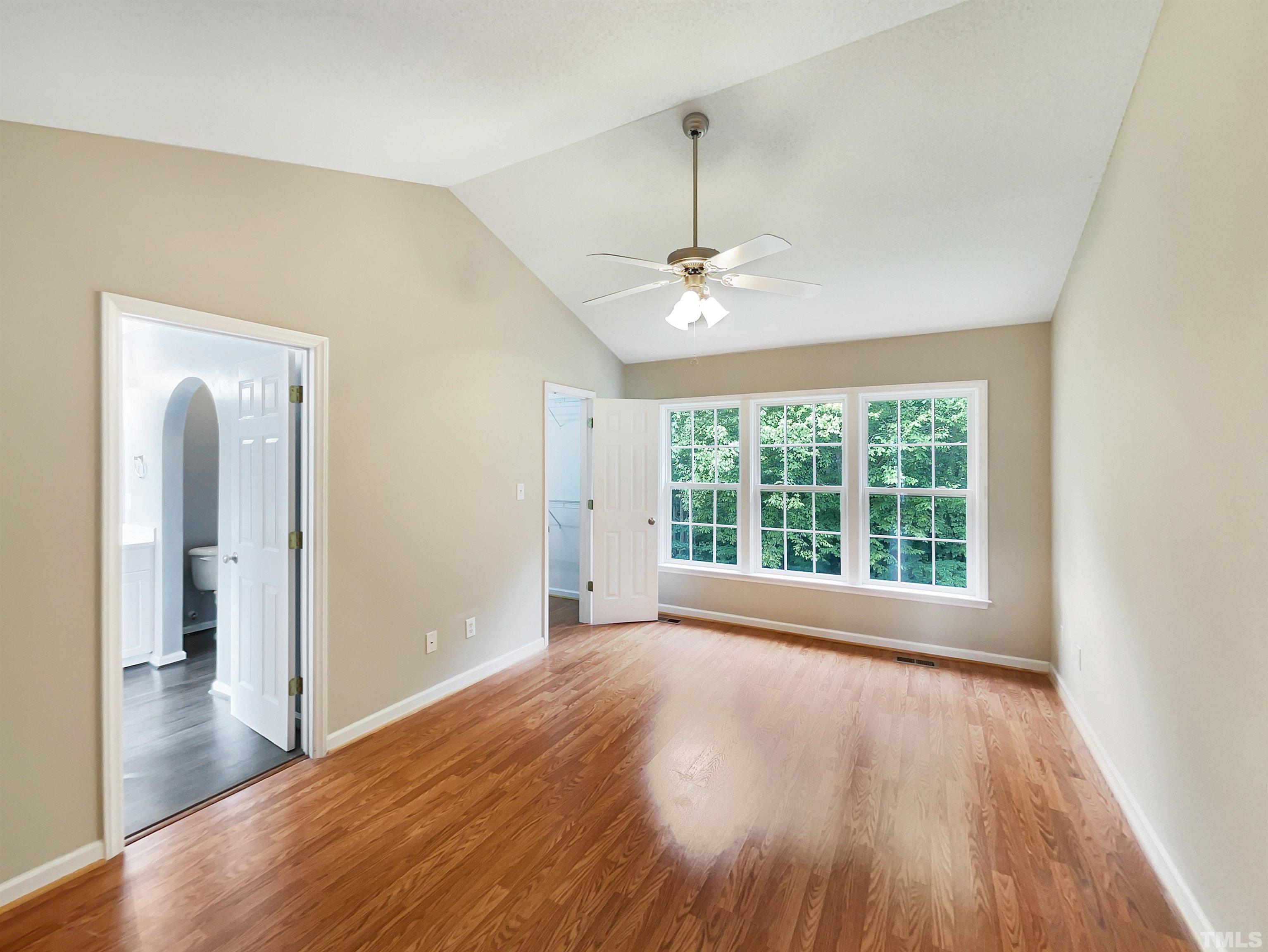 3626 Enduring Freedom Drive Raleigh, NC 27610 - Photo 14 of 17 a view of empty room with wooden floor and fan