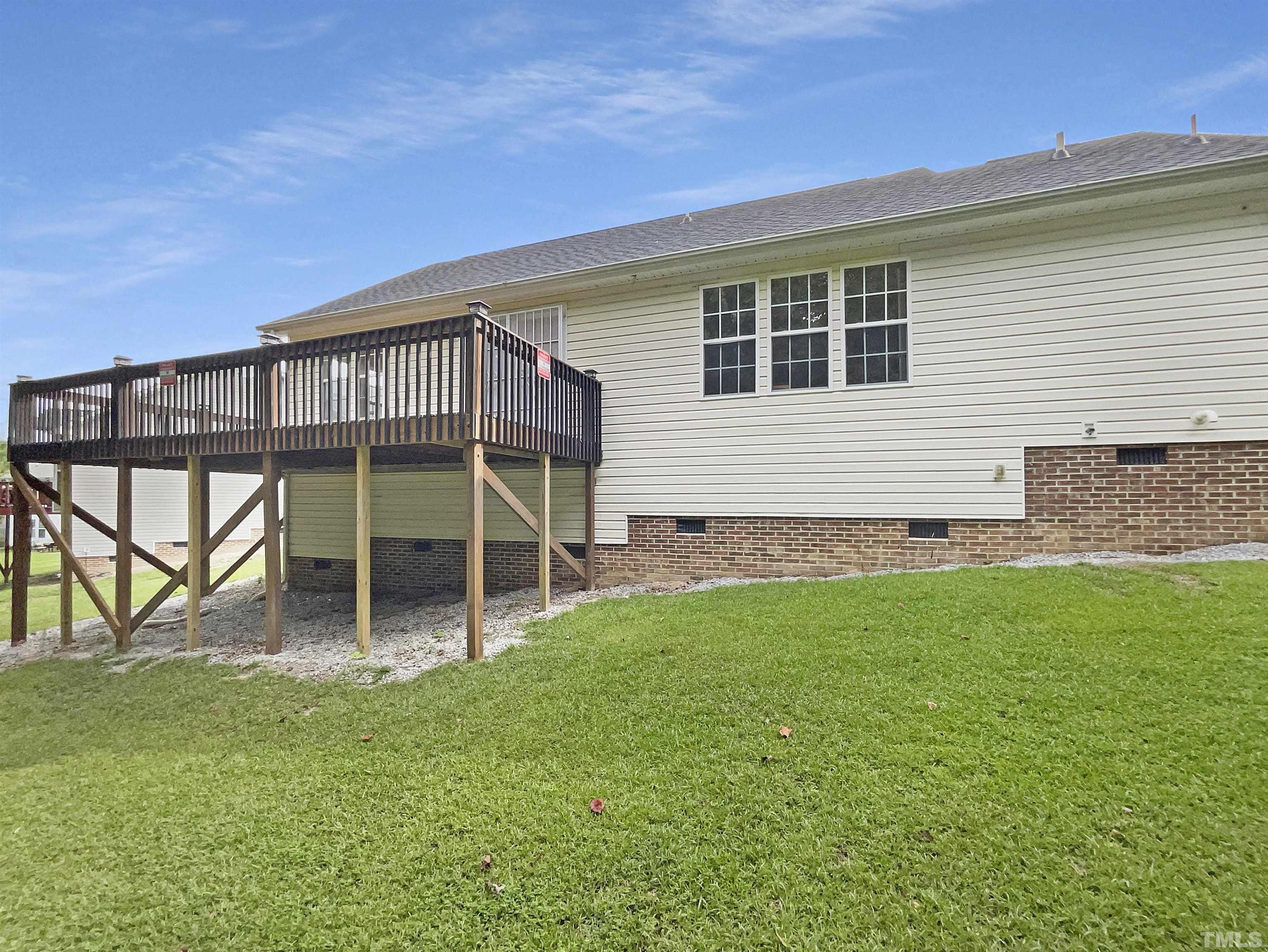 3626 Enduring Freedom Drive Raleigh, NC 27610 - Photo 5 of 17 a view of a house with a backyard