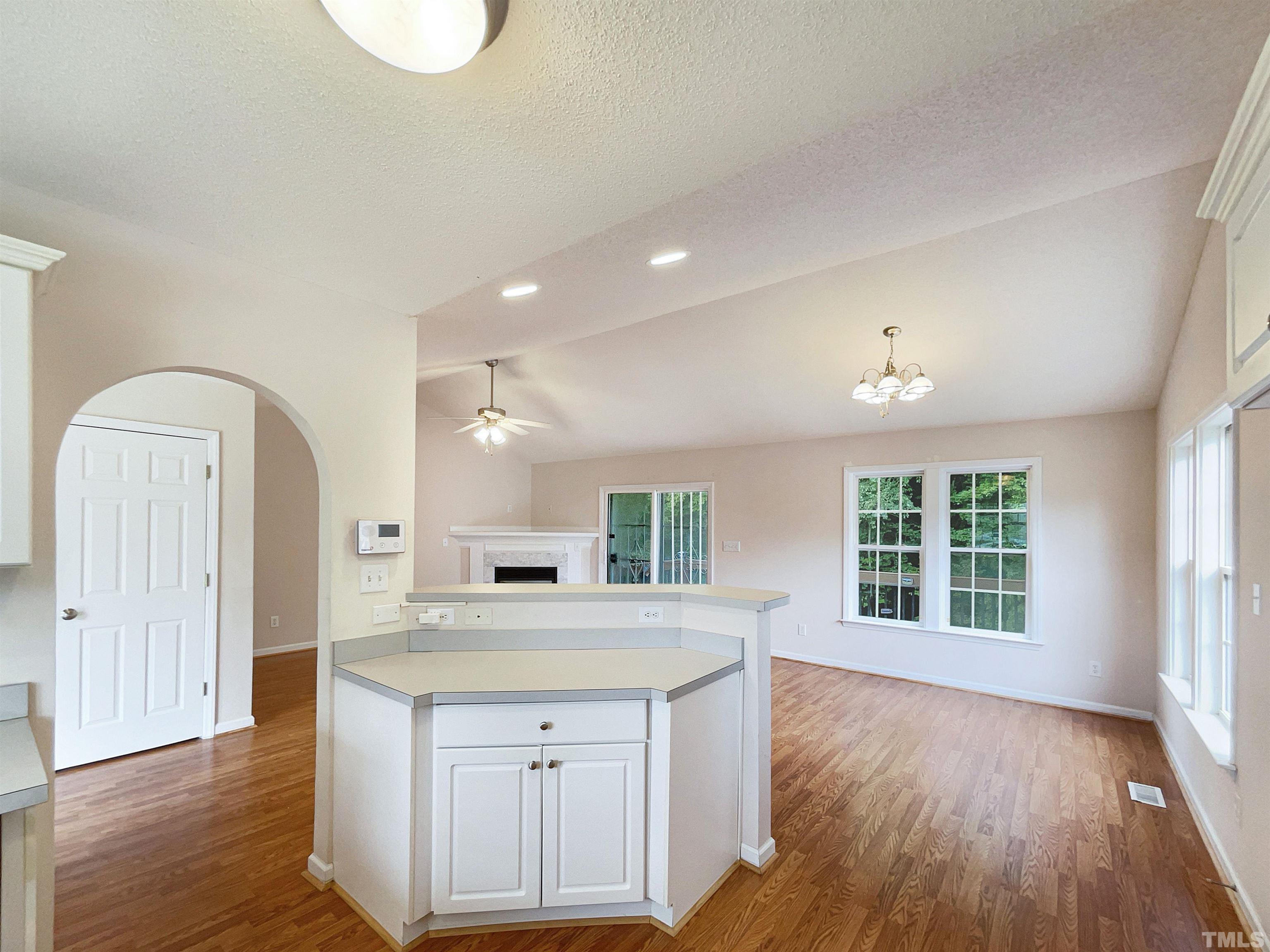 3626 Enduring Freedom Drive Raleigh, NC 27610 - Photo 10 of 17 an open kitchen with a sink and dish washer
