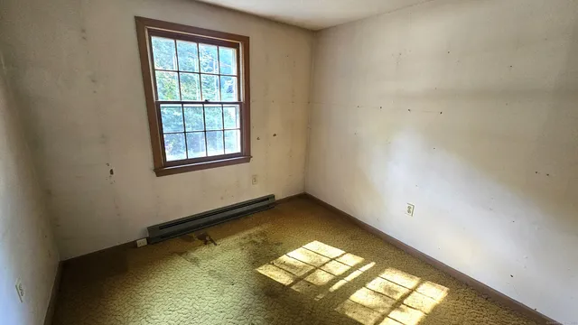 an empty room with windows