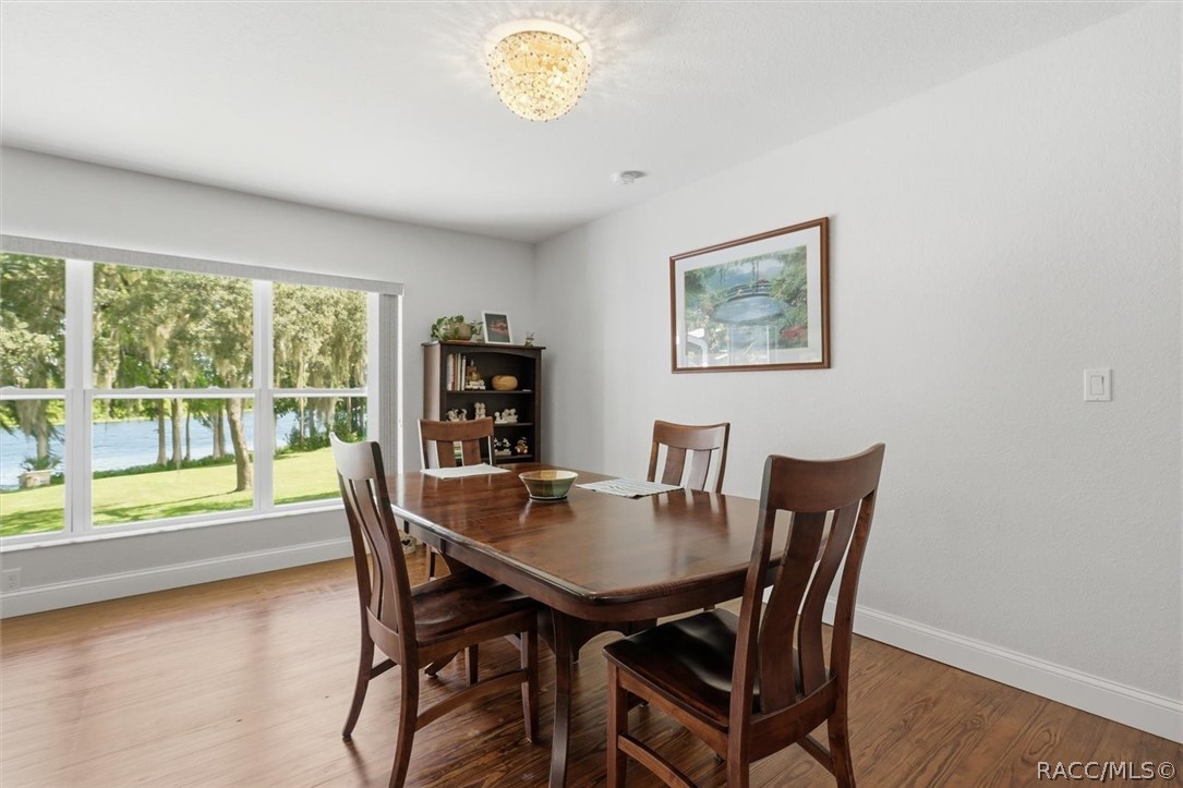 4099 West Ridge Court Dunnellon, FL 34433 - Photo 21 of 49 Great dining area included in the Great Room with breathtaking view of Paradise? Notice those 6" baseboards? Beautiful extra features add impressive value and comfort.