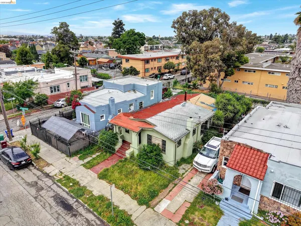 an aerial view of a houses with outdoor space