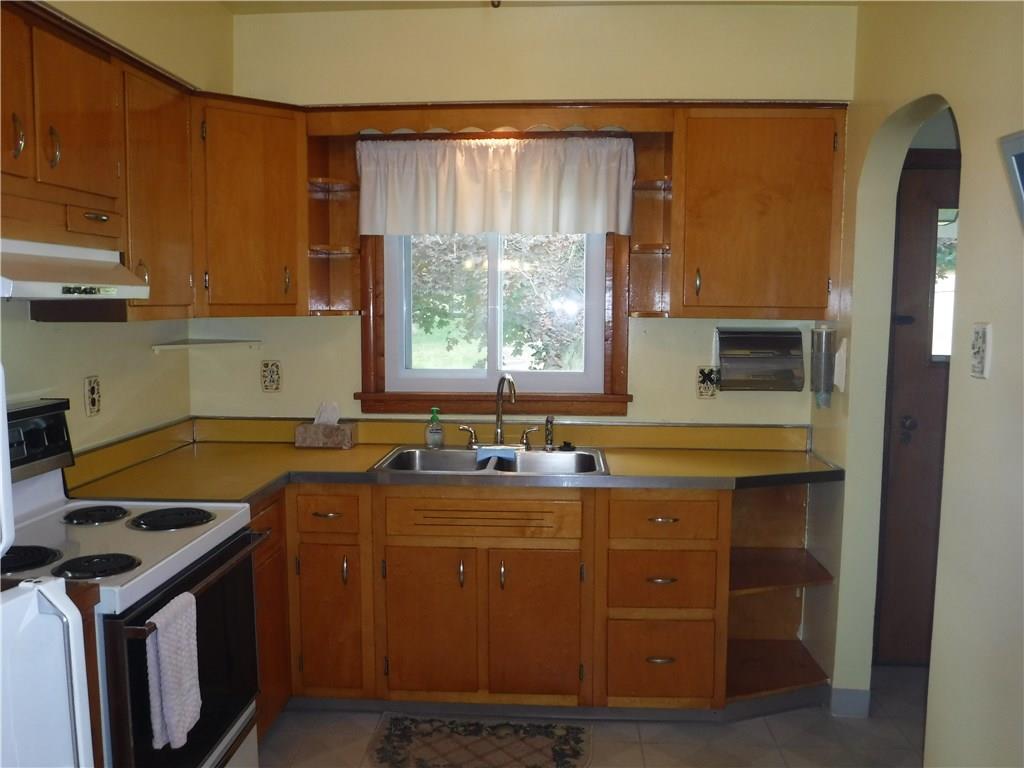 1425 Harvey Run Road Freedom, PA 15042 - Photo 11 of 25 Kitchen view to back and alcove to back covered porch to the right