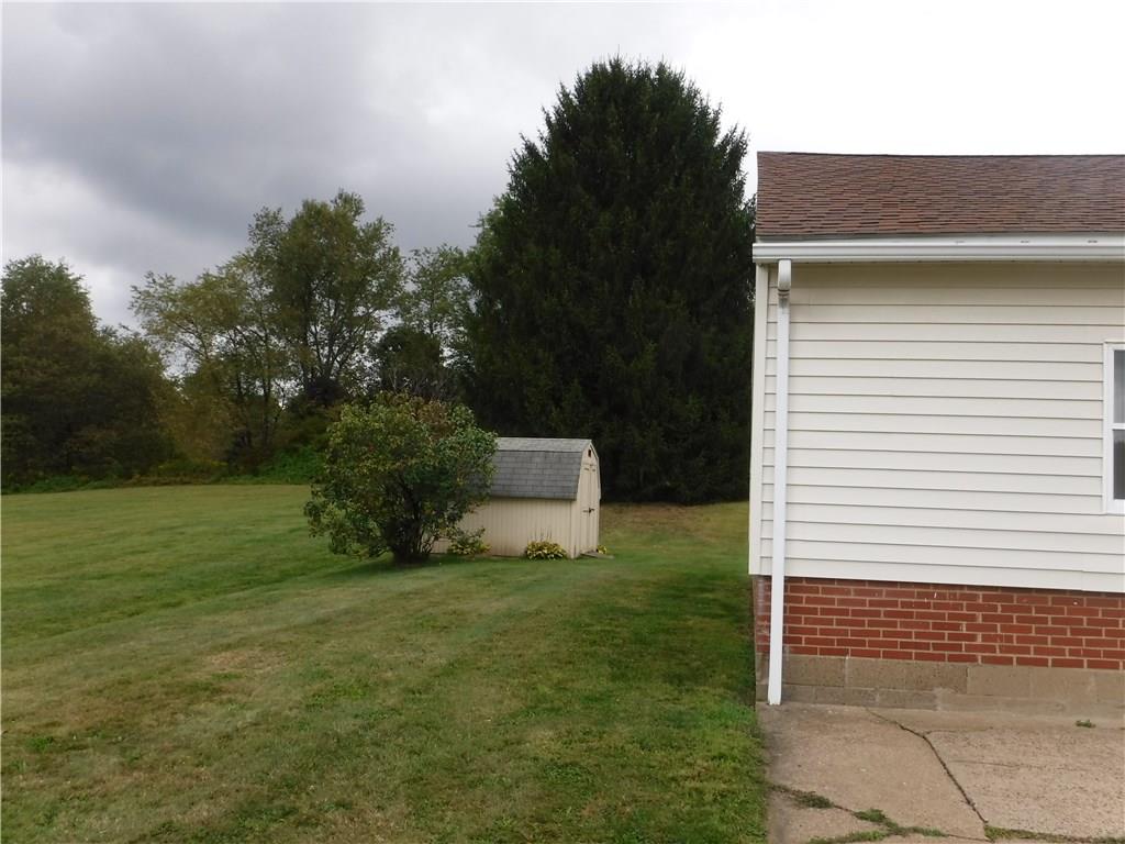 1425 Harvey Run Road Freedom, PA 15042 - Photo 3 of 25 Side yard and shed