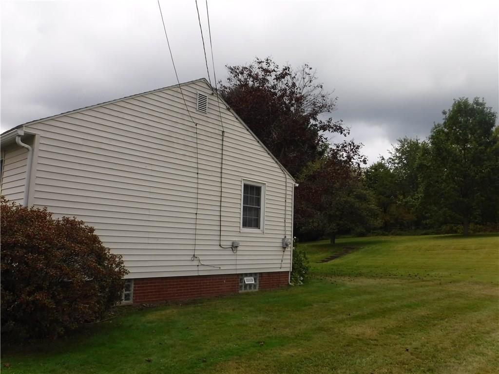 1425 Harvey Run Road Freedom, PA 15042 - Photo 25 of 25 Side view of house and yard