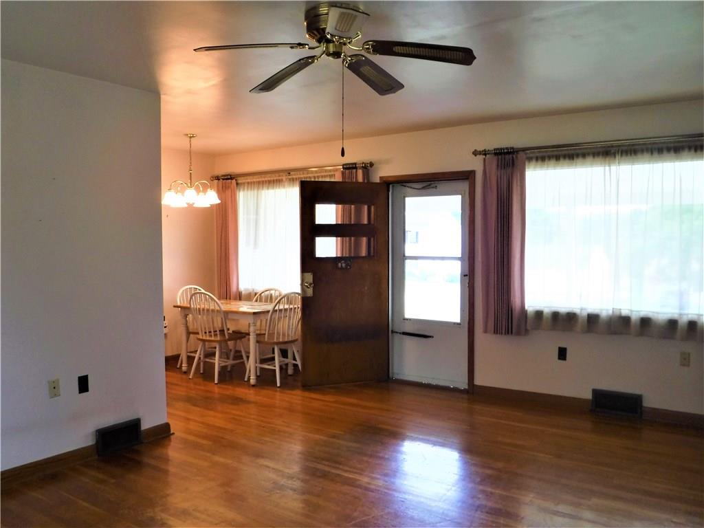 1425 Harvey Run Road Freedom, PA 15042 - Photo 8 of 25 living room view of dining room and front door