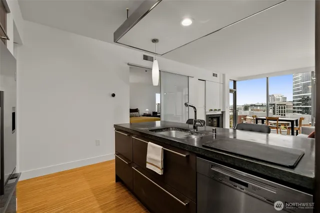 a kitchen with sink cabinets and counter top space