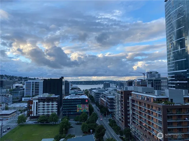 a view of a balcony with city view