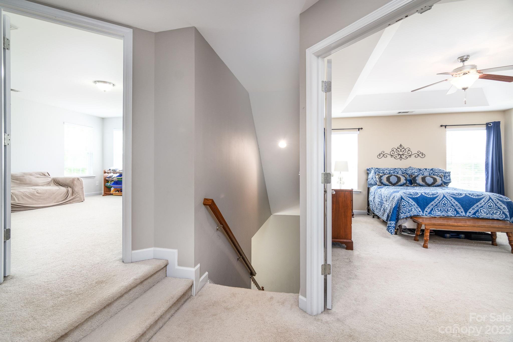 582 Evening Mist Drive Fort Mill, SC 29708 - Photo 15 of 31 a bedroom with furniture and a mirror