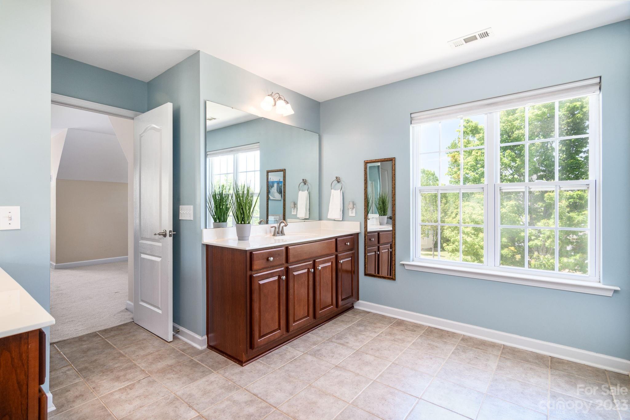 582 Evening Mist Drive Fort Mill, SC 29708 - Photo 20 of 31 a kitchen with stainless steel appliances granite countertop a refrigerator and a sink