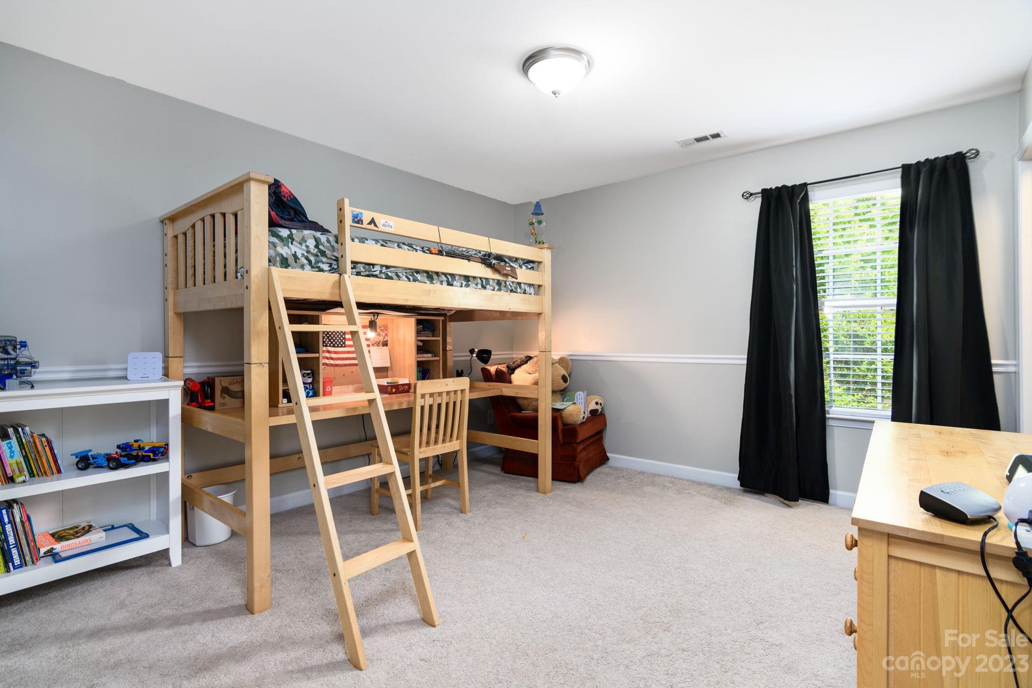 582 Evening Mist Drive Fort Mill, SC 29708 - Photo 24 of 31 a view of a livingroom with furniture and windows