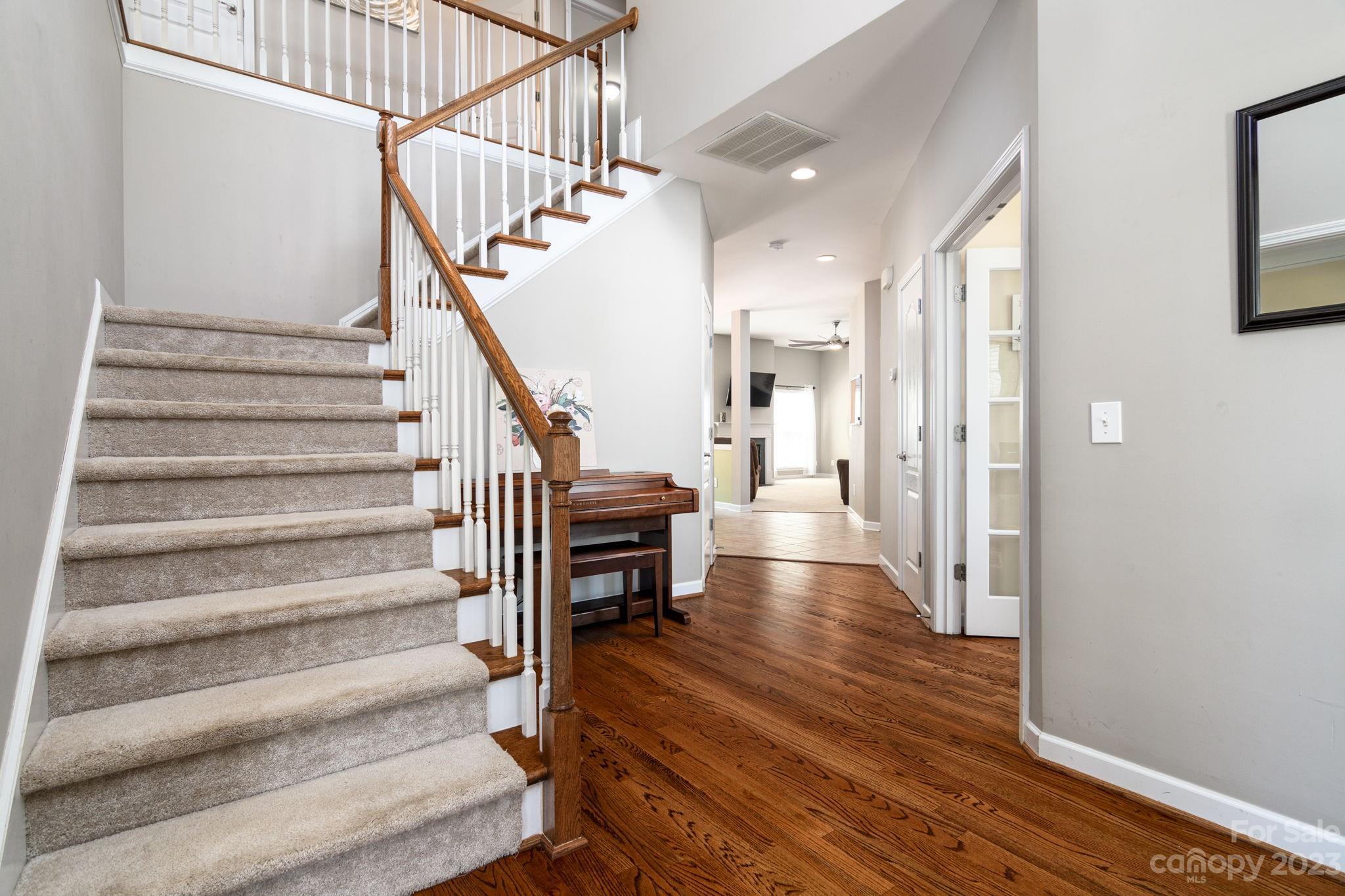 582 Evening Mist Drive Fort Mill, SC 29708 - Photo 3 of 31 a view of entryway and hall with wooden floor