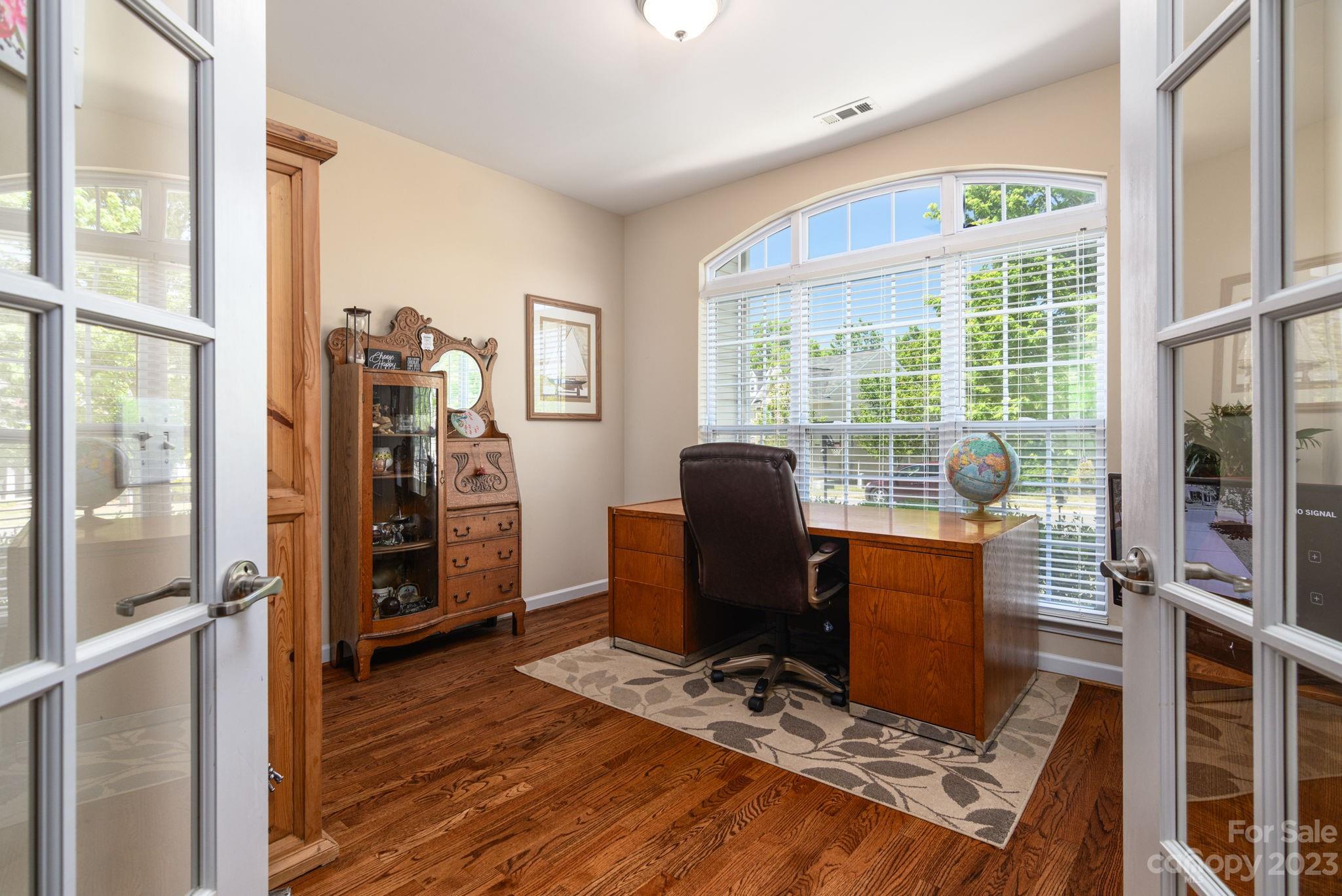 582 Evening Mist Drive Fort Mill, SC 29708 - Photo 4 of 31 a view of a workspace with furniture and a window