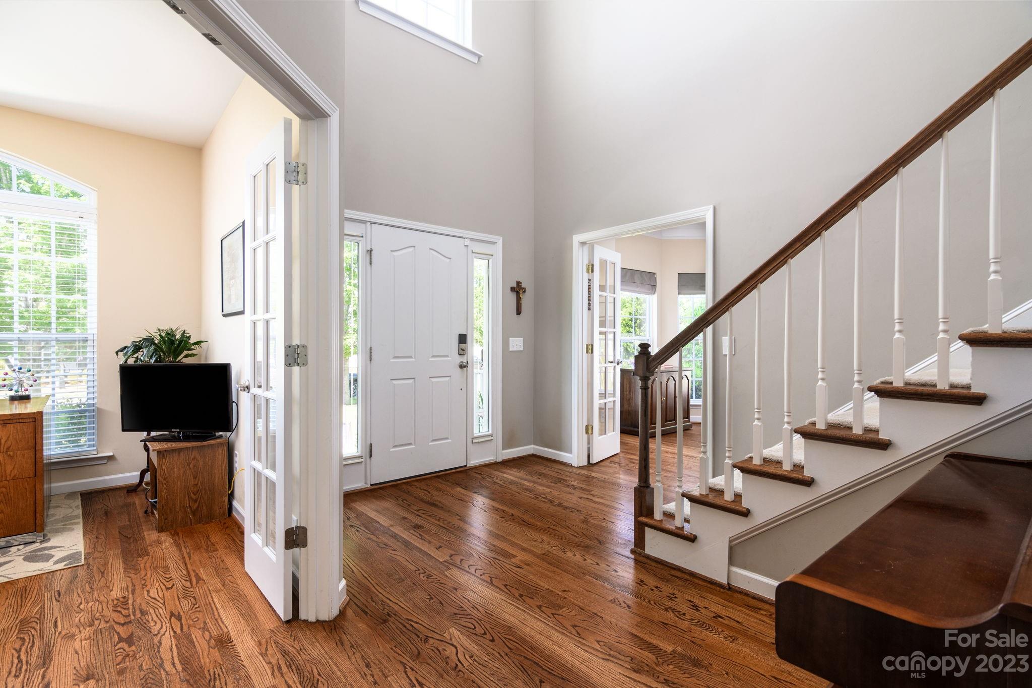 582 Evening Mist Drive Fort Mill, SC 29708 - Photo 5 of 31 a view of entryway with wooden floor and staircase