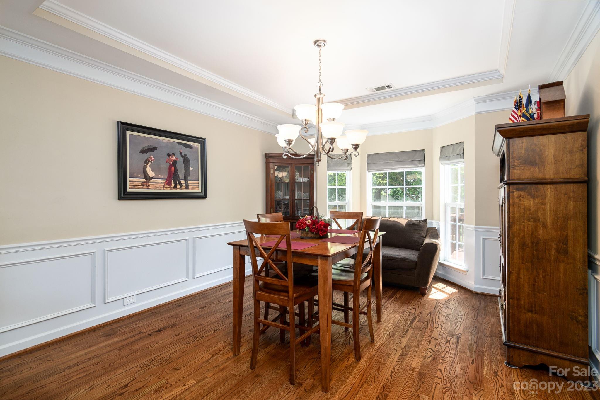 582 Evening Mist Drive Fort Mill, SC 29708 - Photo 7 of 31 a view of a dining room with furniture window and wooden floor