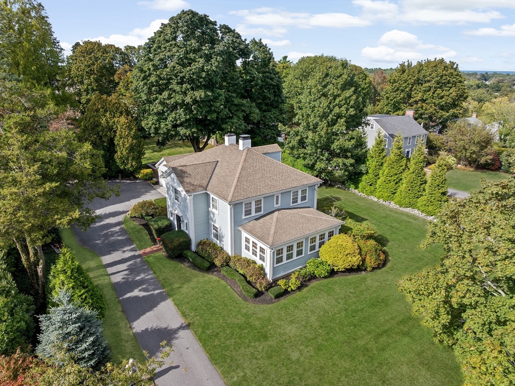 73 Pond Street Cohasset, MA 02025 - Photo 2 of 42 an aerial view of a house with a big yard