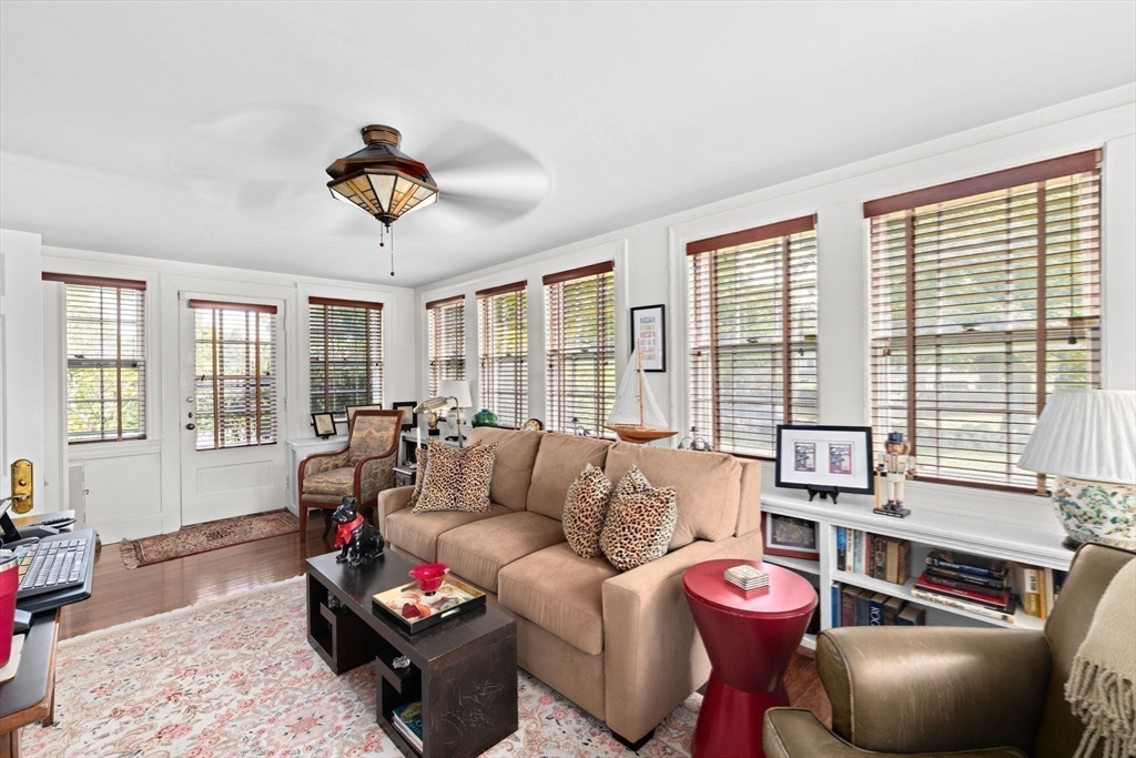 73 Pond Street Cohasset, MA 02025 - Photo 26 of 42 a living room with furniture and a large window