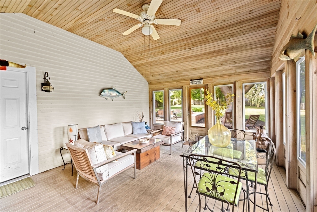 73 Pond Street Cohasset, MA 02025 - Photo 39 of 42 a balcony with furniture and wooden floor