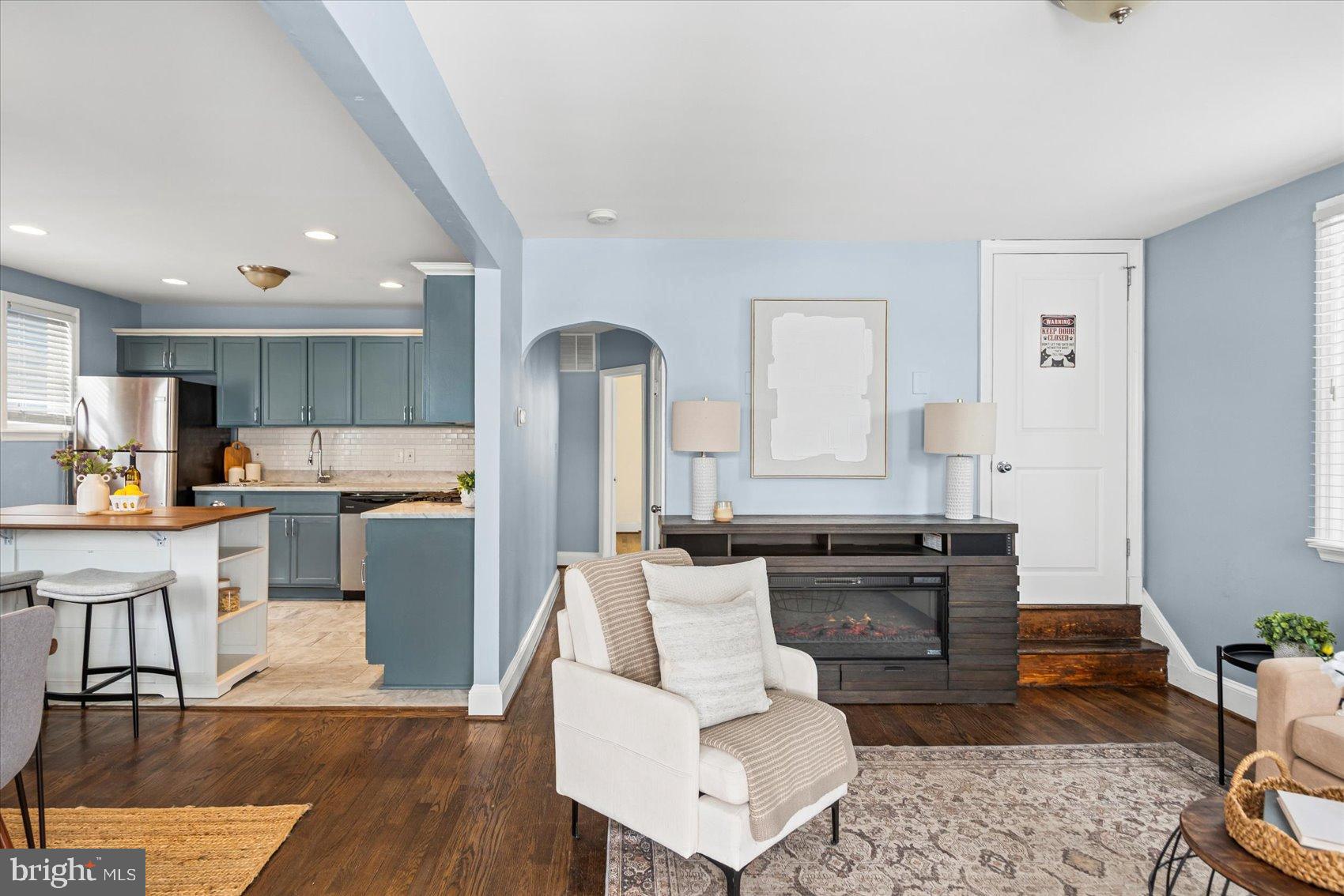 7708 Middlesex Place Parkville, MD 21234 - Photo 14 of 37 Charming open-concept living space awaits.