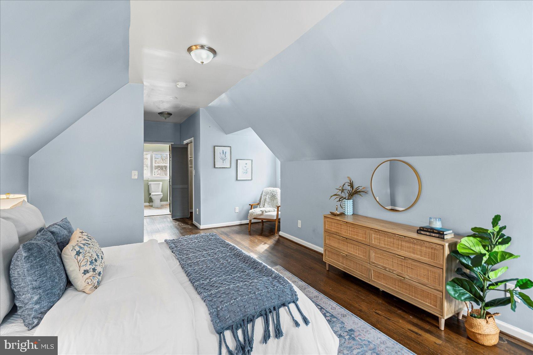 7708 Middlesex Place Parkville, MD 21234 - Photo 17 of 37 Serene attic retreat with soft blue hues.