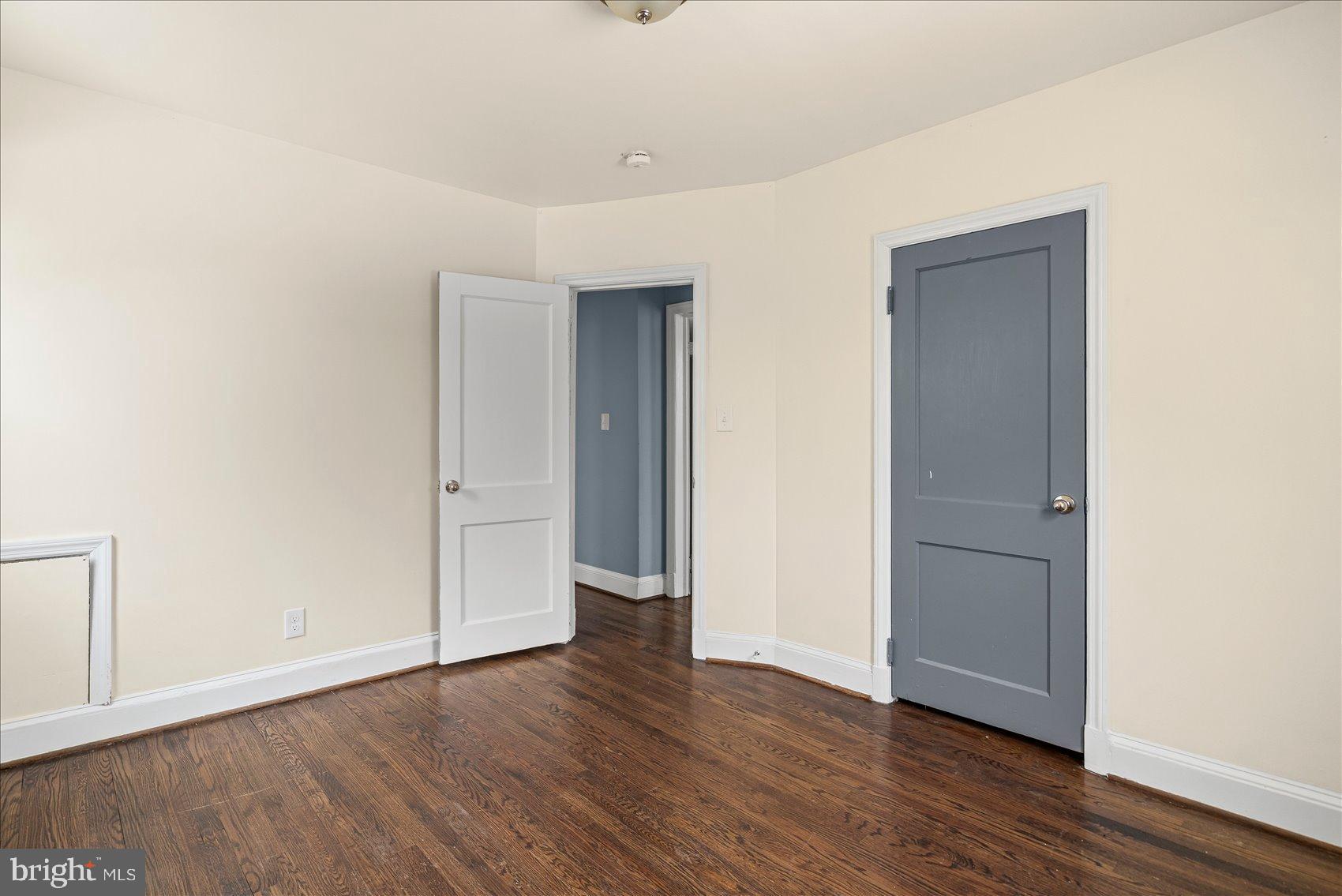 7708 Middlesex Place Parkville, MD 21234 - Photo 23 of 37 Spacious room with elegant hardwood floors.