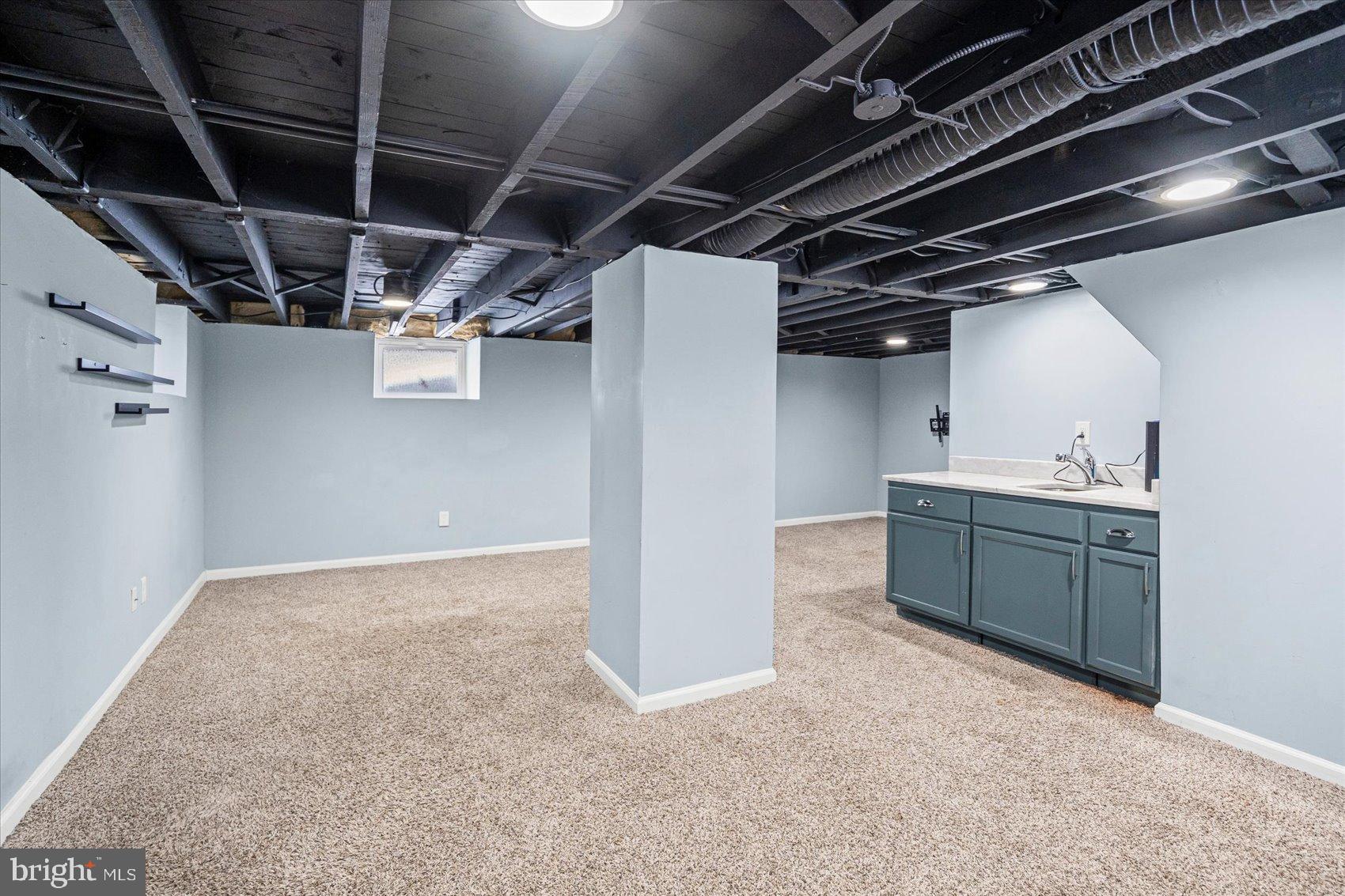 7708 Middlesex Place Parkville, MD 21234 - Photo 26 of 37 Versatile basement space ready for your vision.