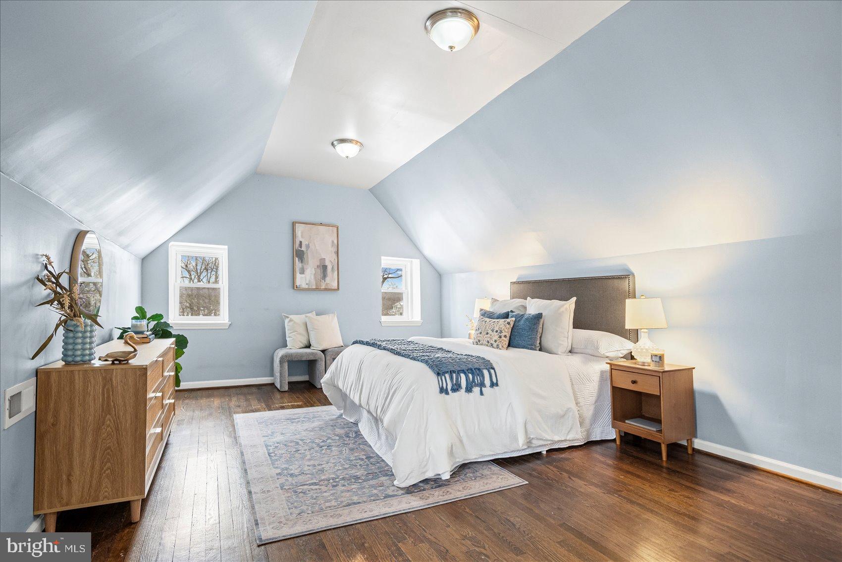 7708 Middlesex Place Parkville, MD 21234 - Photo 4 of 37 Serene attic retreat with soft blue hues.