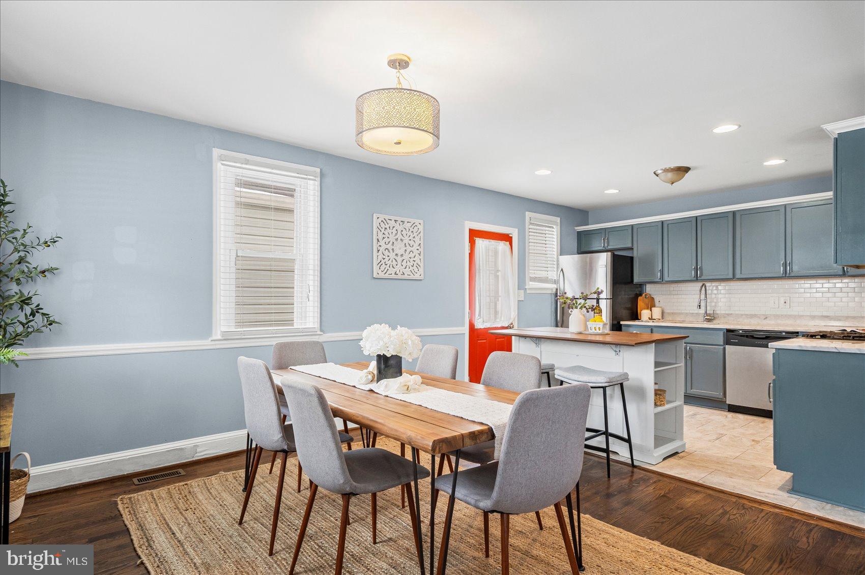 7708 Middlesex Place Parkville, MD 21234 - Photo 5 of 37 Charming dining area with modern flair.