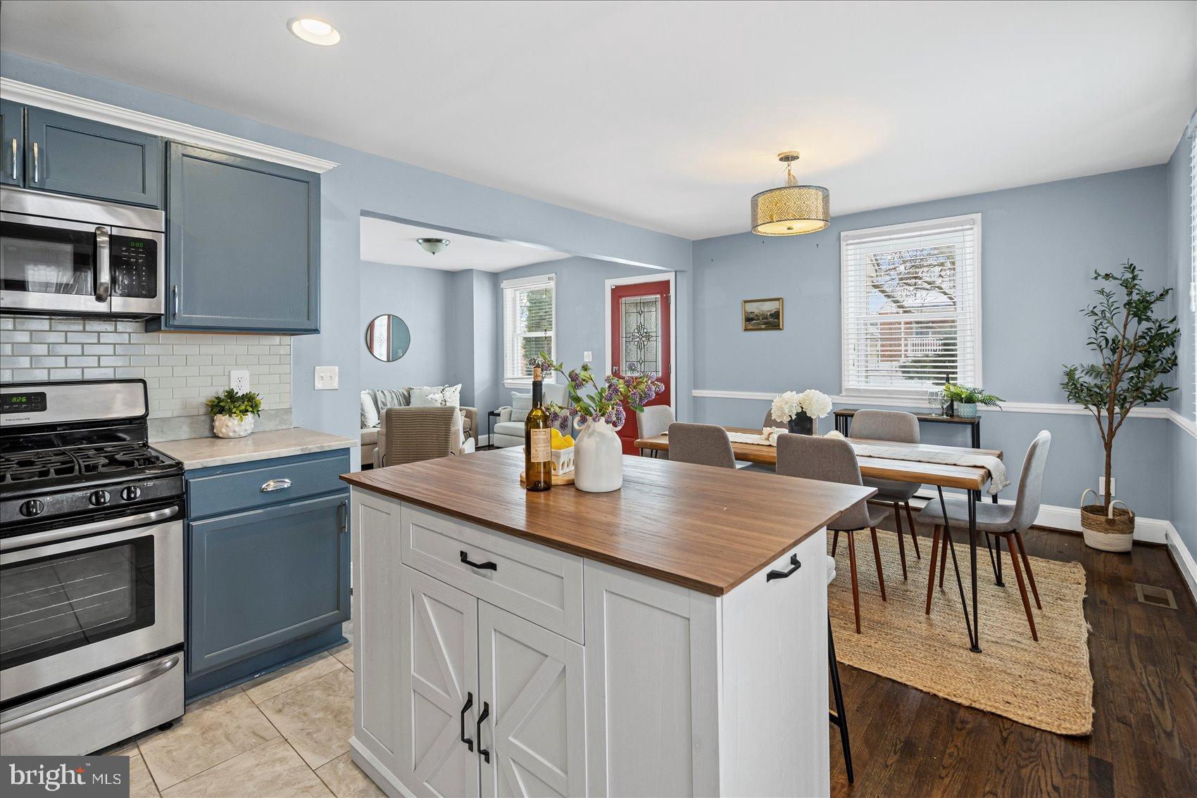 7708 Middlesex Place Parkville, MD 21234 - Photo 7 of 37 Charming kitchen with modern touches.