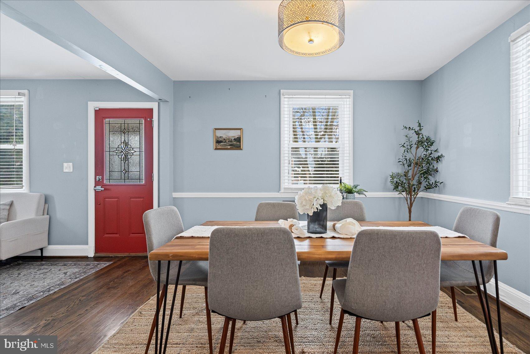 7708 Middlesex Place Parkville, MD 21234 - Photo 9 of 37 Charming dining space with vibrant accents.