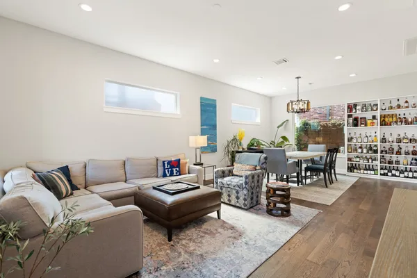 a living room with furniture and a table