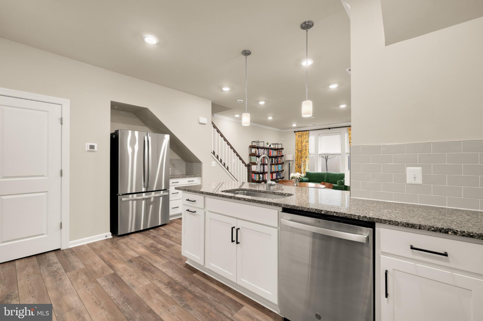 14967 River Walk Way Woodbridge, VA 22191 - Photo 11 of 38 Modern kitchen with sleek finishes.