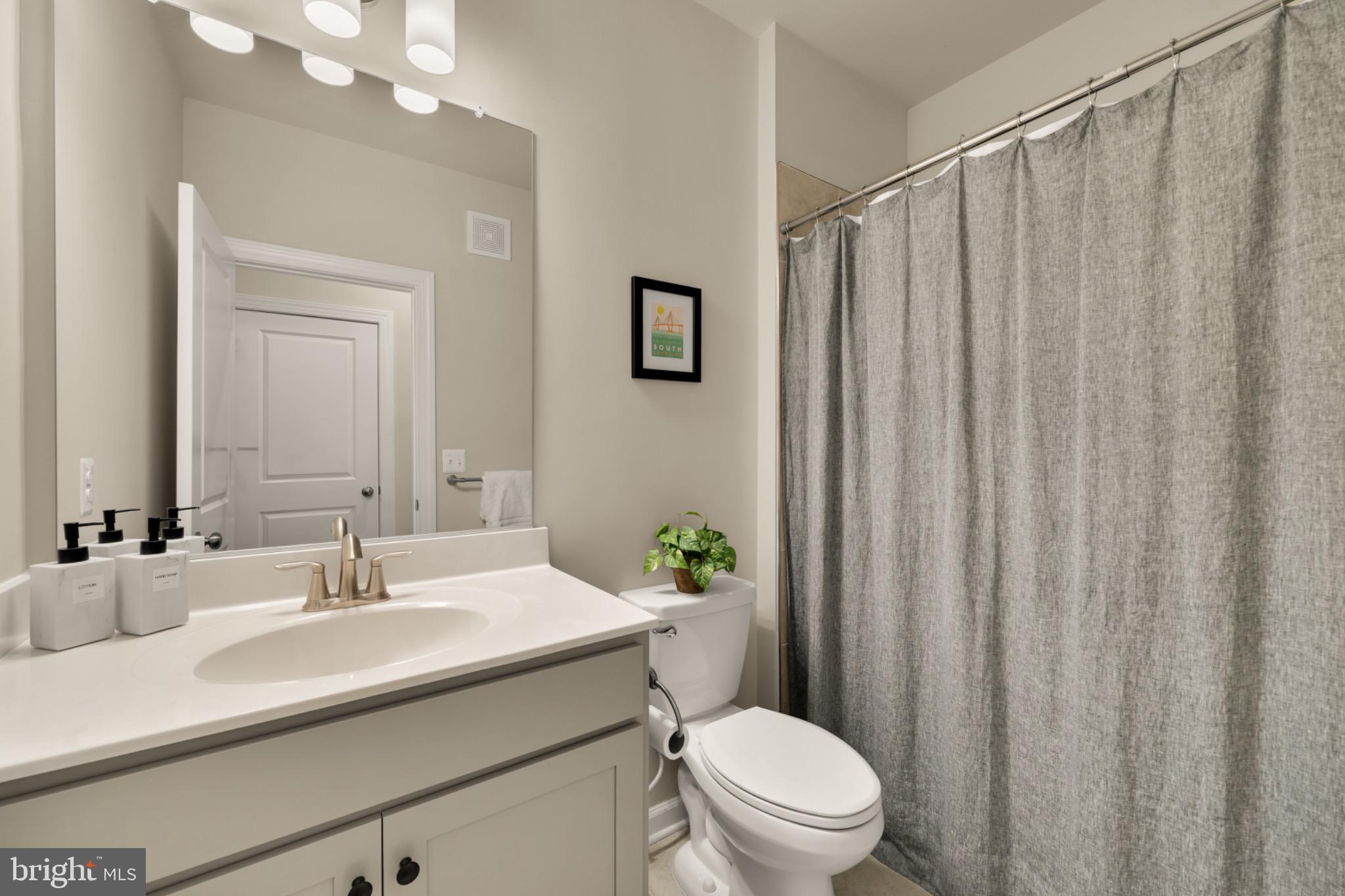 14967 River Walk Way Woodbridge, VA 22191 - Photo 27 of 38 Modern bathroom with serene color palette.
