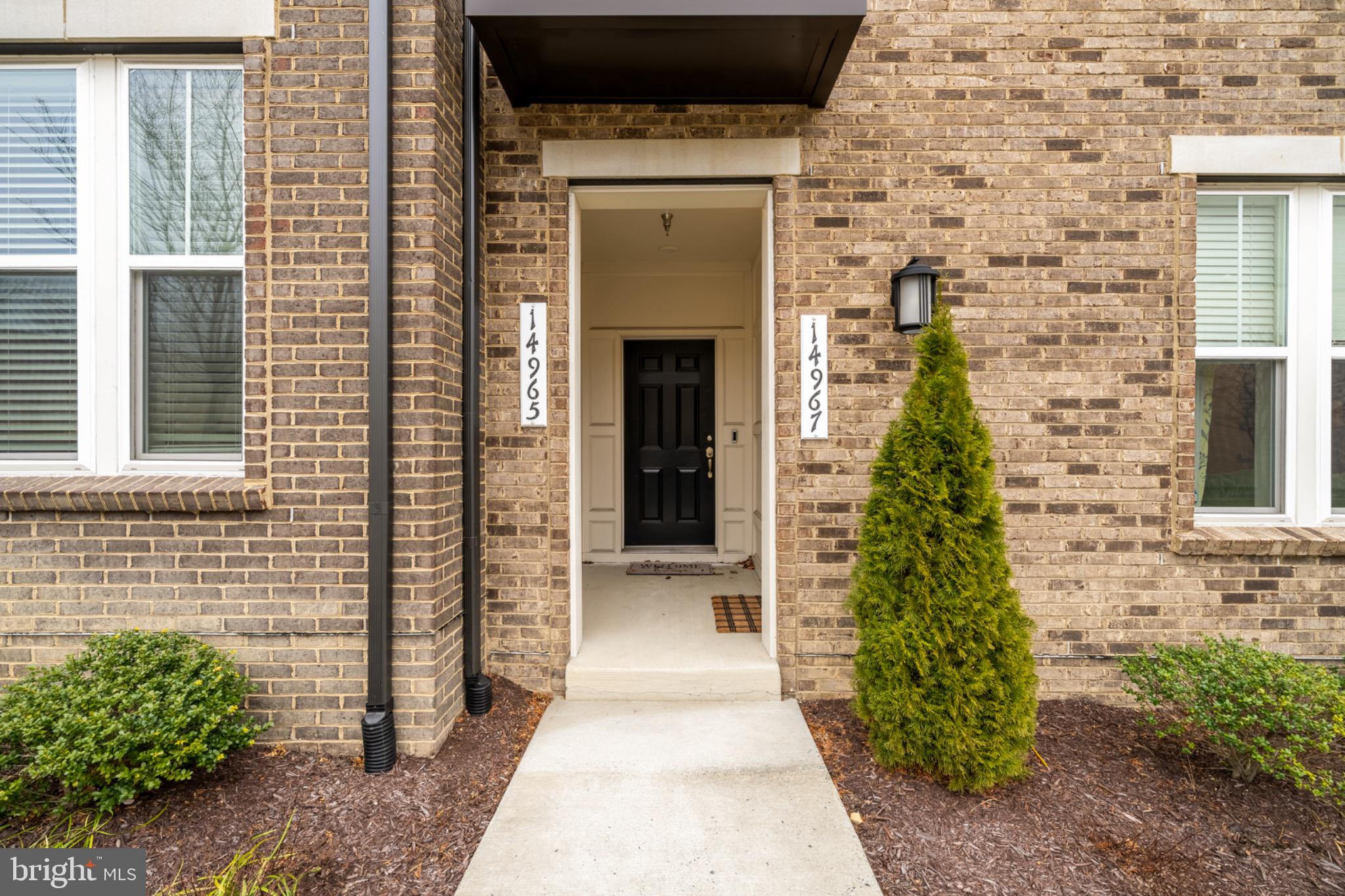 14967 River Walk Way Woodbridge, VA 22191 - Photo 34 of 38 Inviting entrance with modern brick facade.