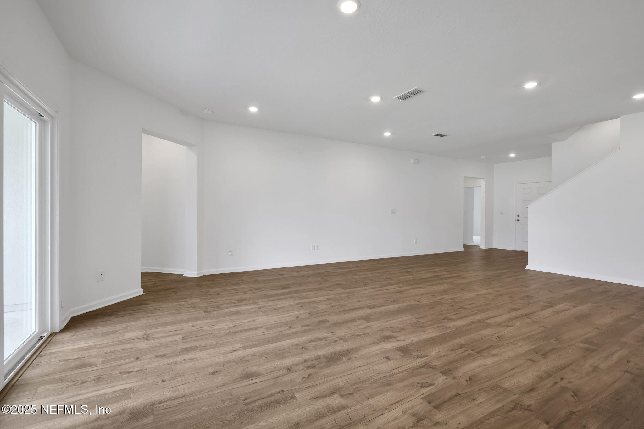 44 Martos Court St. Augustine, FL 32095 - Photo 12 of 40 a view of an empty room with wooden floor