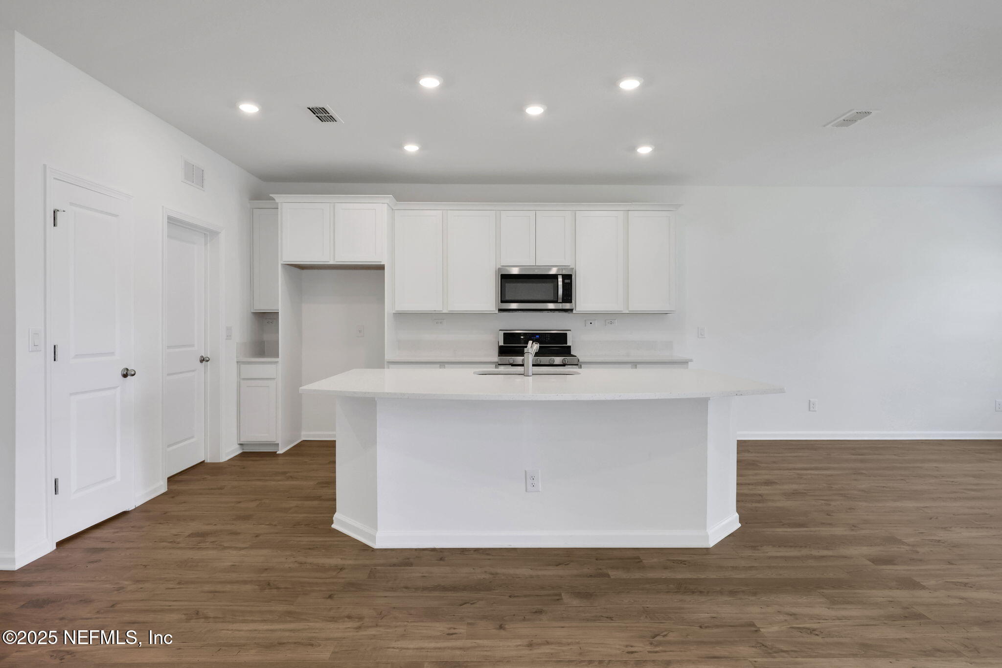44 Martos Court St. Augustine, FL 32095 - Photo 14 of 40 a view of kitchen with stainless steel appliances granite countertop a stove a sink and a refrigerator