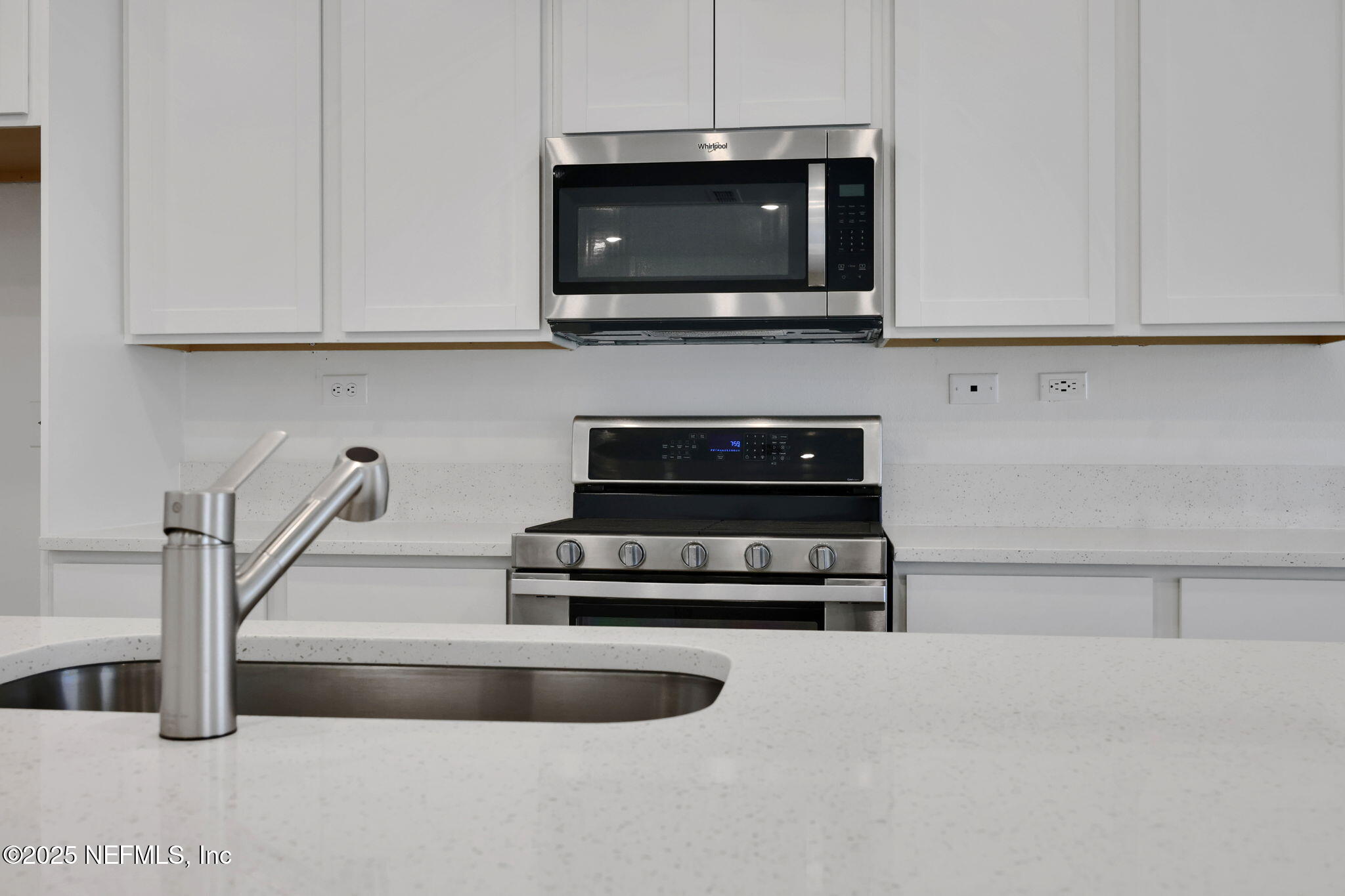 44 Martos Court St. Augustine, FL 32095 - Photo 15 of 40 a kitchen with stainless steel appliances a stove and a microwave